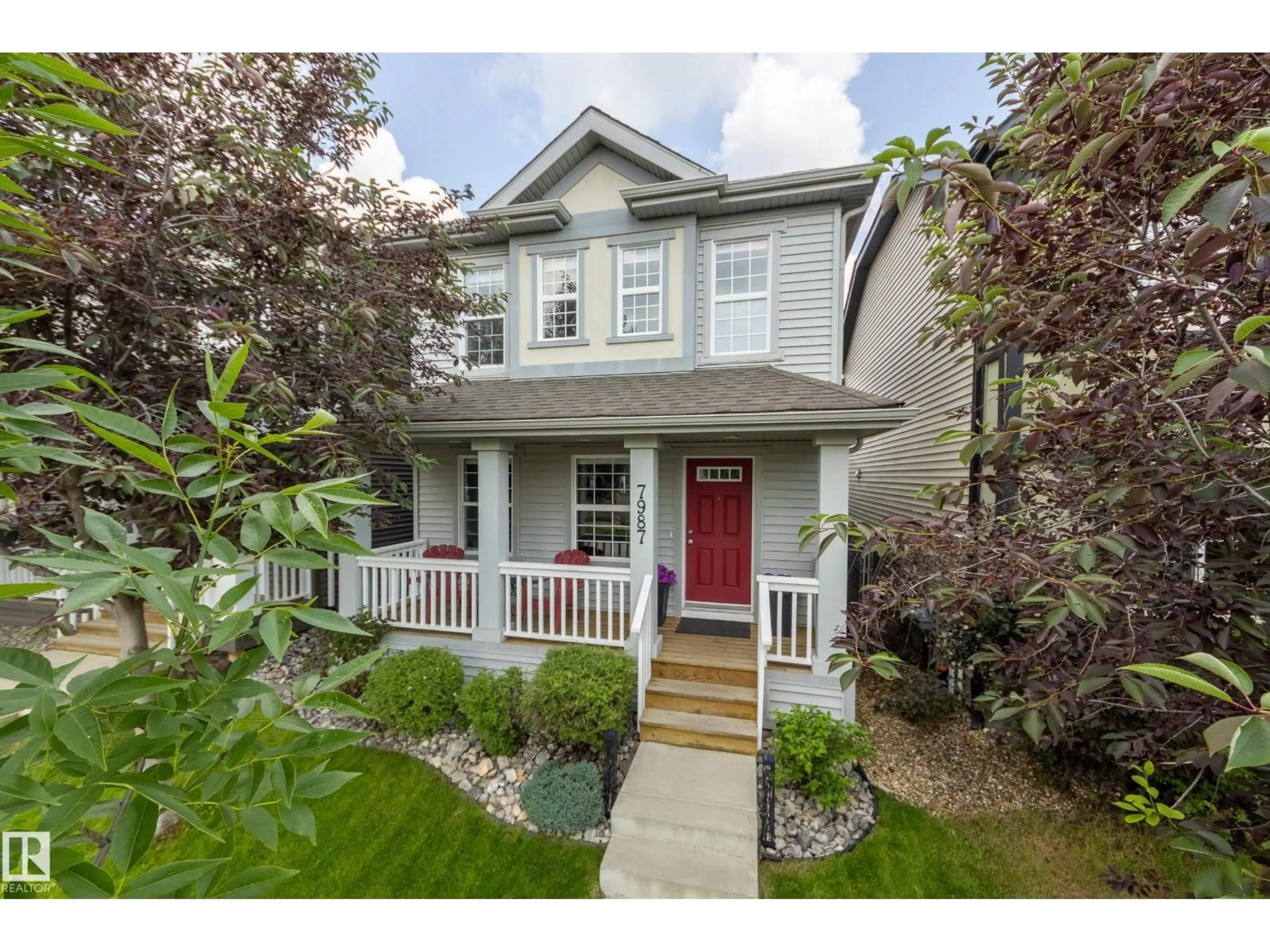 Home with vinyl exterior material, street for 7987 ERASMUS CR, Edmonton Alberta T6M0S2