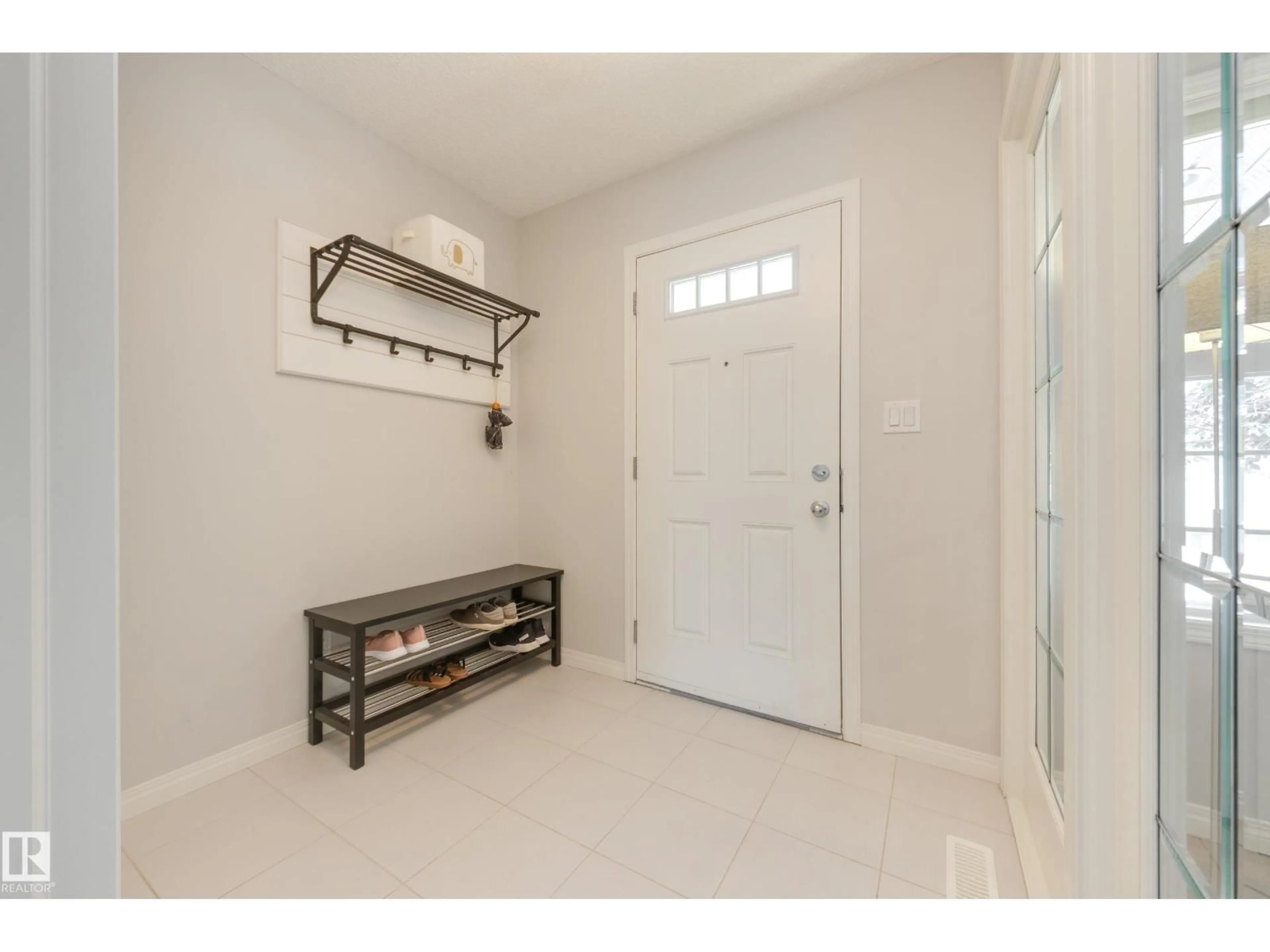 Indoor entryway for 7987 ERASMUS CR, Edmonton Alberta T6M0S2