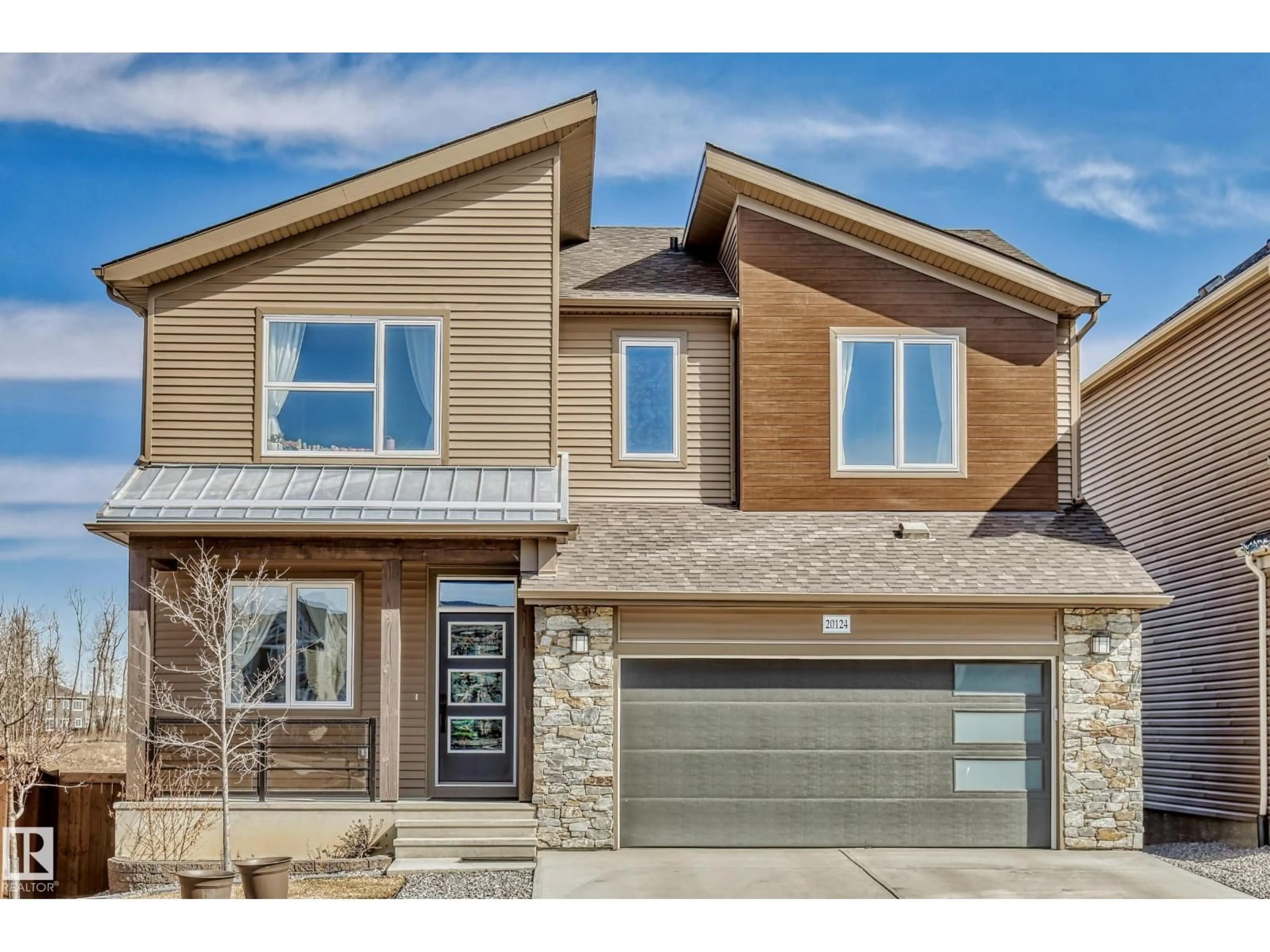 Home with brick exterior material, street for NW - 20124 17 AV, Edmonton Alberta T6M1K6