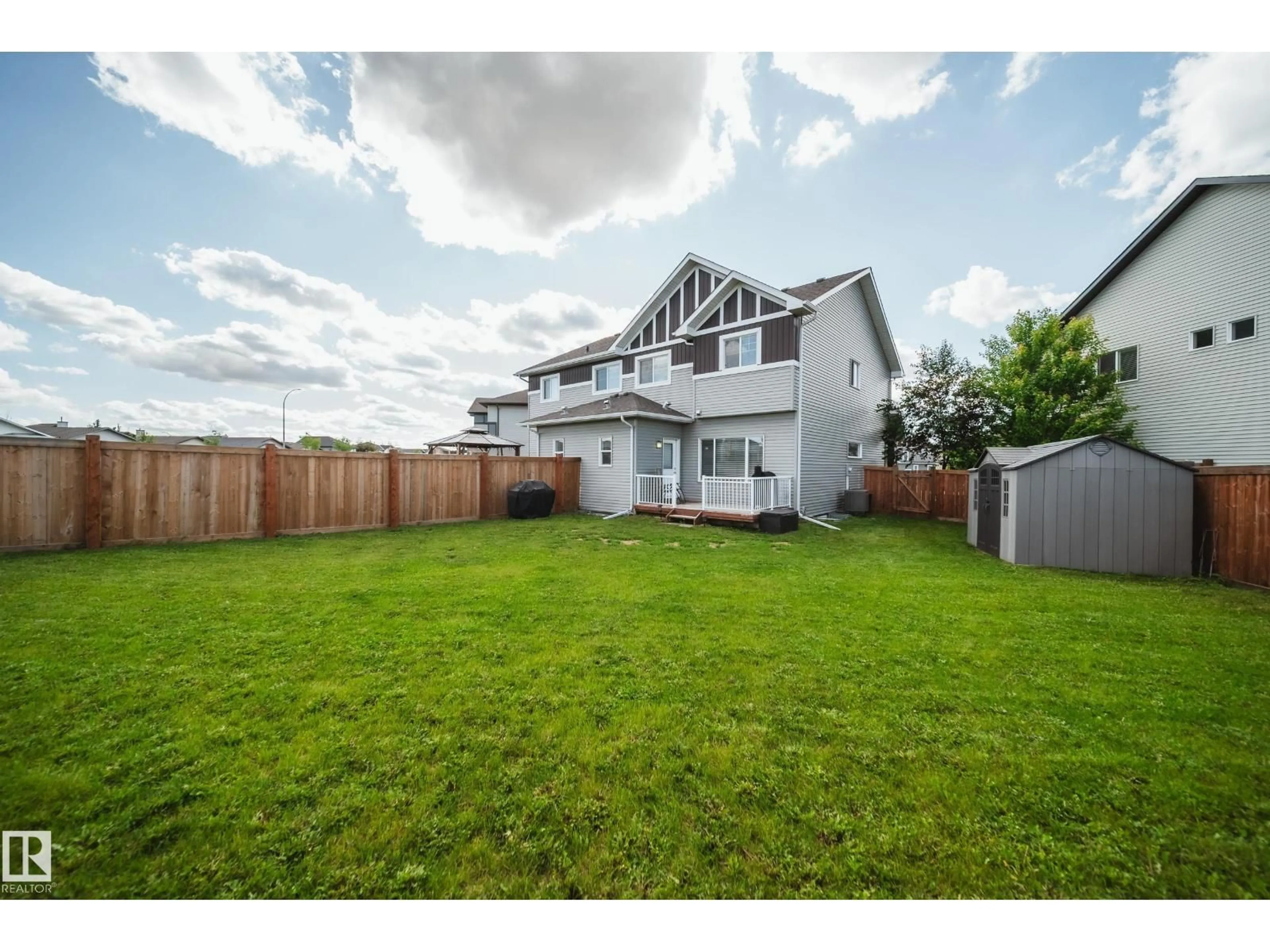 A pic from outside/outdoor area/front of a property/back of a property/a pic from drone, street for 6305 167A AV, Edmonton Alberta T5Y3P7