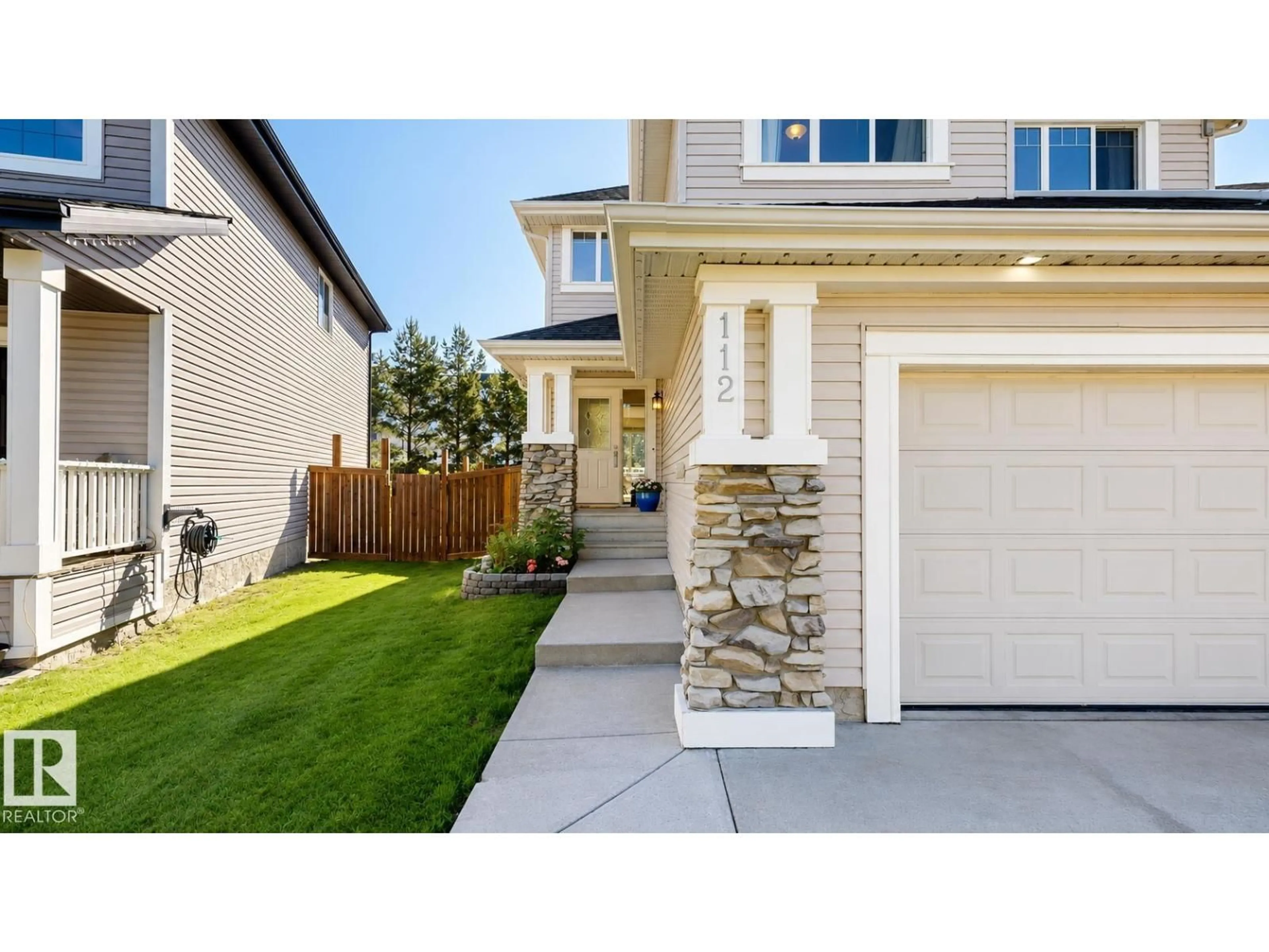 Home with vinyl exterior material, street for 112 BECKER CR, Fort Saskatchewan Alberta T8L0C2