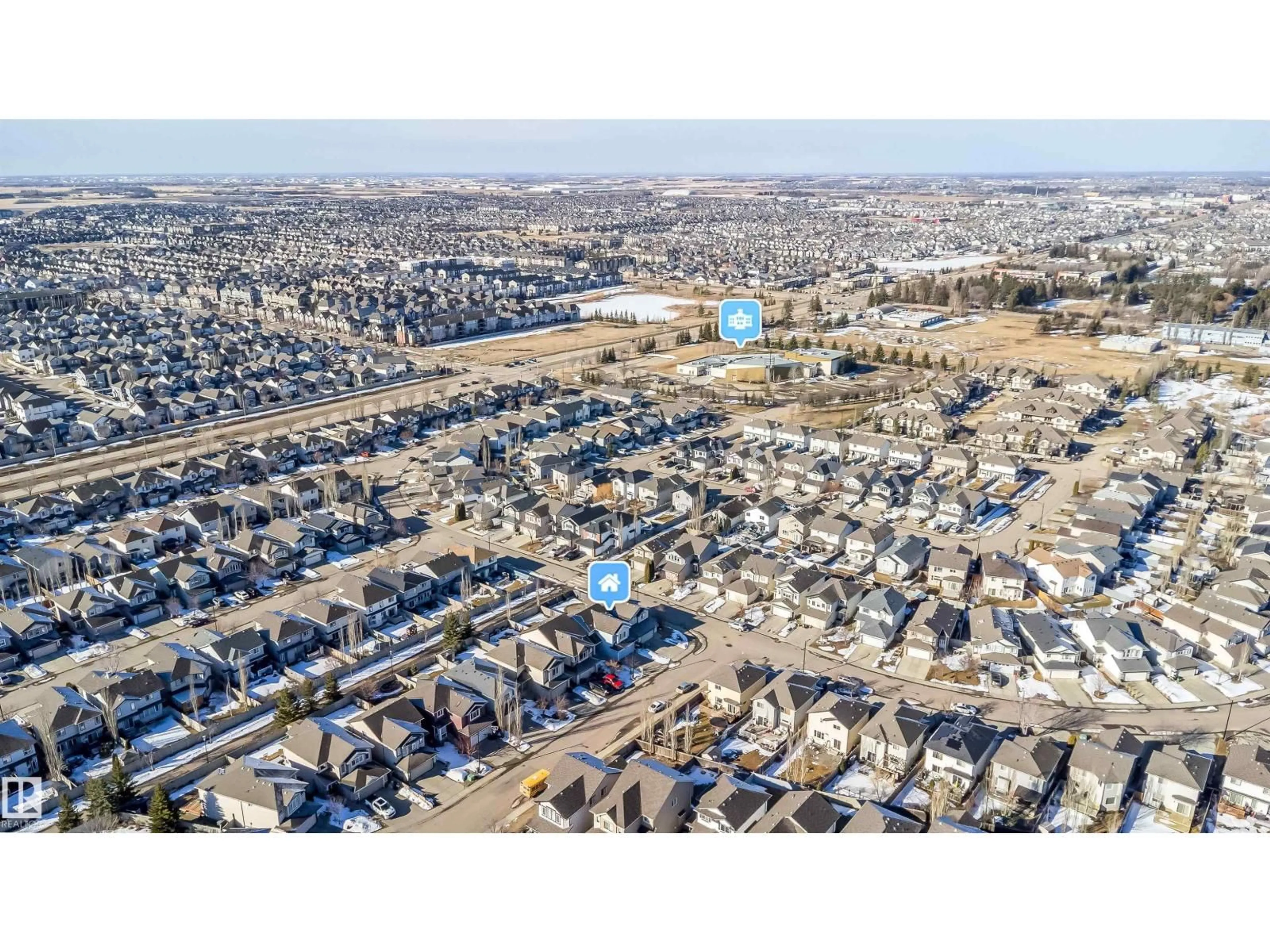 A pic from outside/outdoor area/front of a property/back of a property/a pic from drone, street for 5935 6 AV, Edmonton Alberta T6X0G4