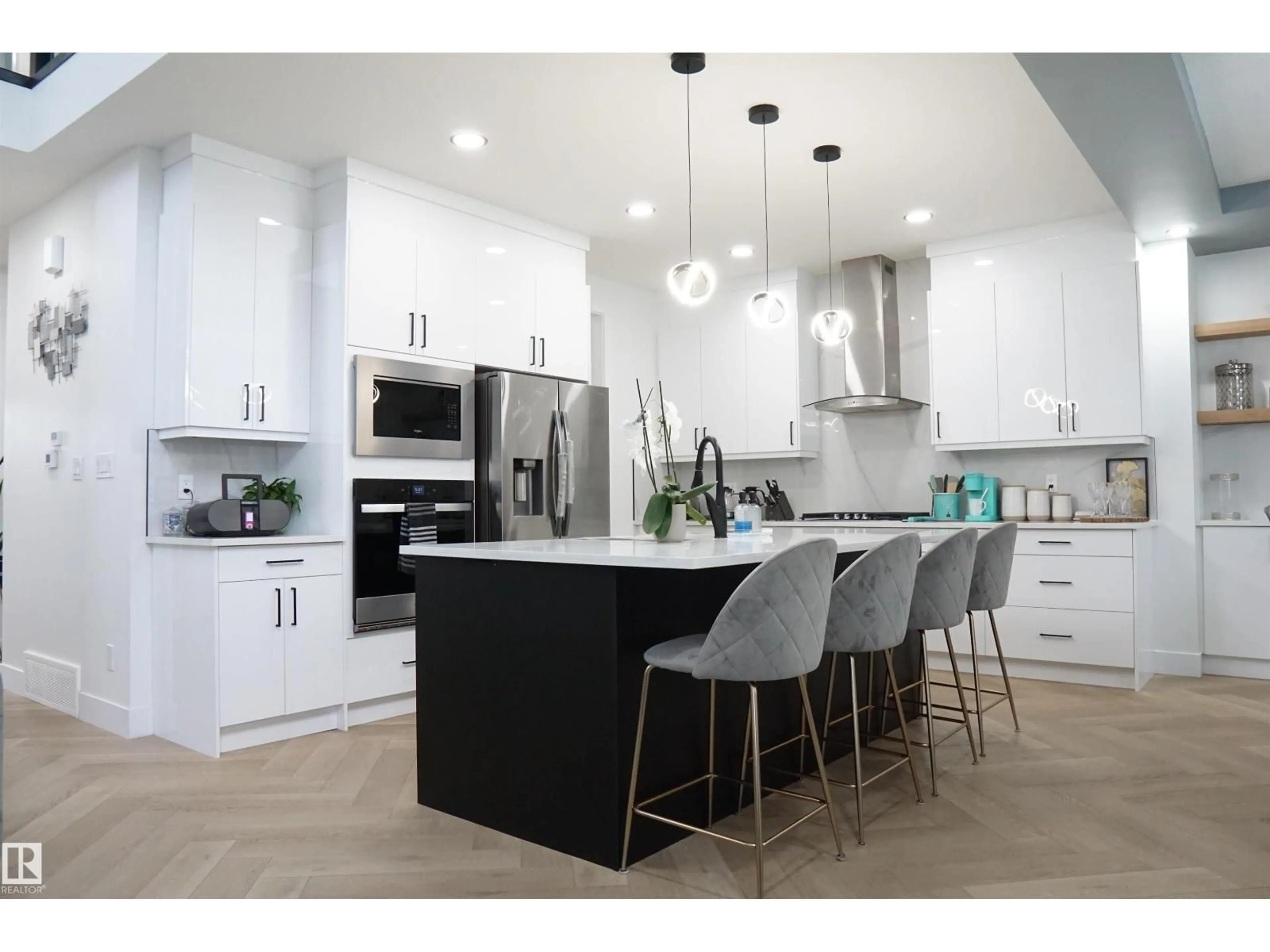 Open concept kitchen, wood/laminate floor for NW - 17703 74 ST, Edmonton Alberta T5Z0V9