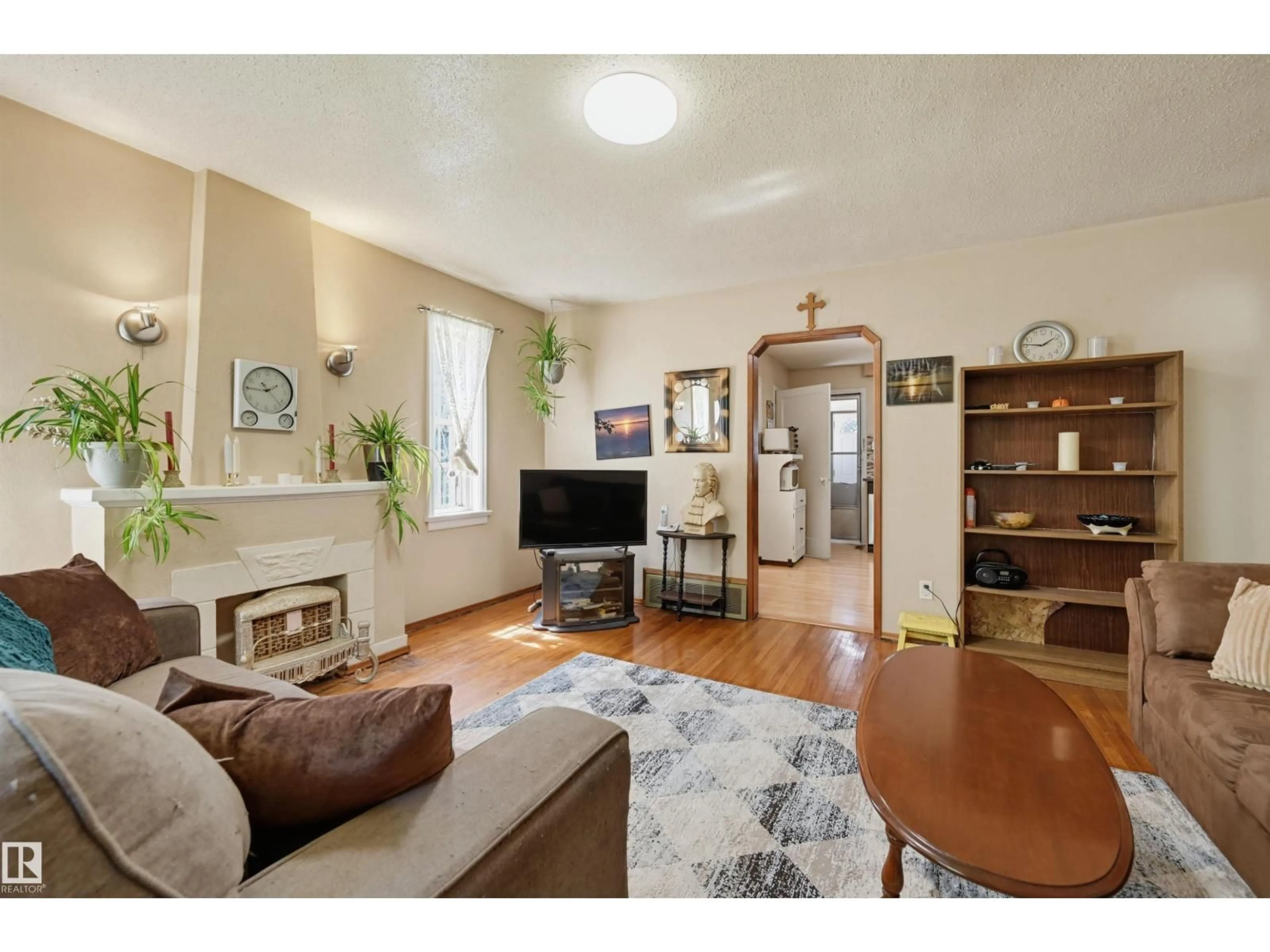 Living room with furniture, unknown for NW - 11414 88 ST, Edmonton Alberta T5B3R1