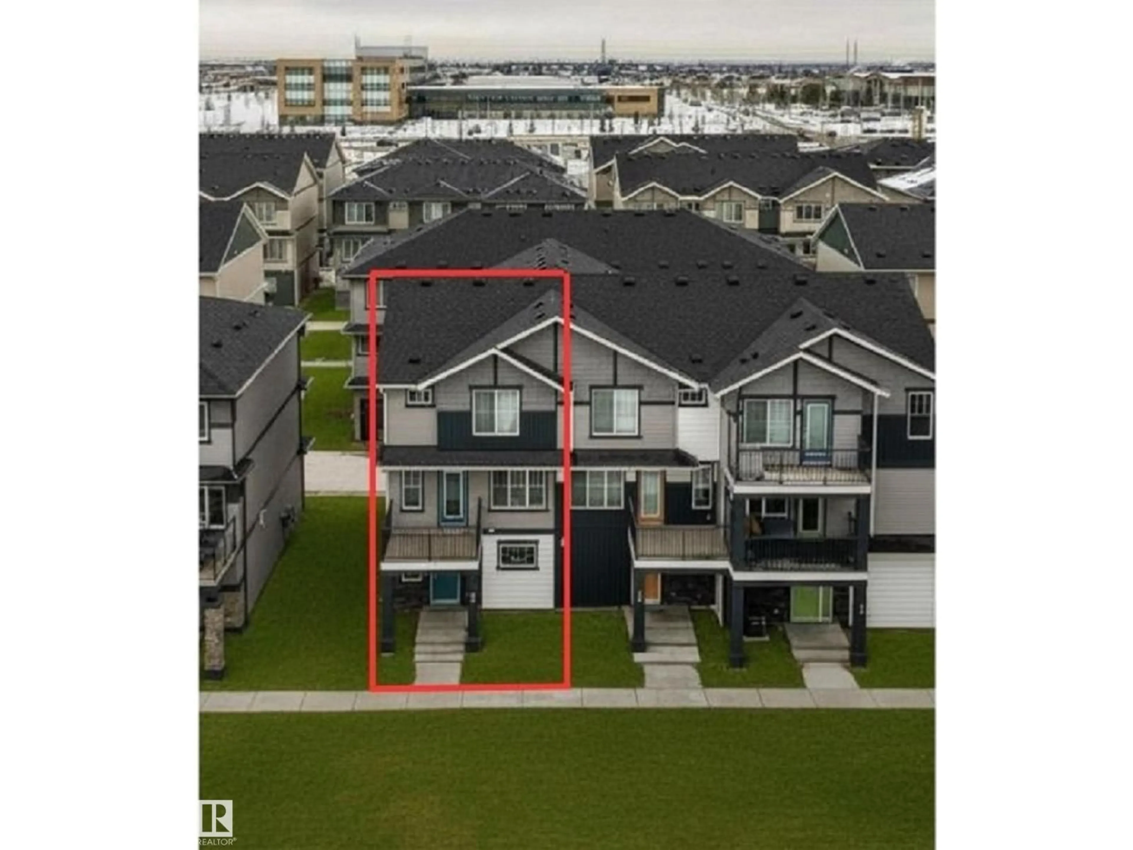 A pic from outside/outdoor area/front of a property/back of a property/a pic from drone, unknown for 1530 - 96 TAMARACK BV, Edmonton Alberta T6T2E6
