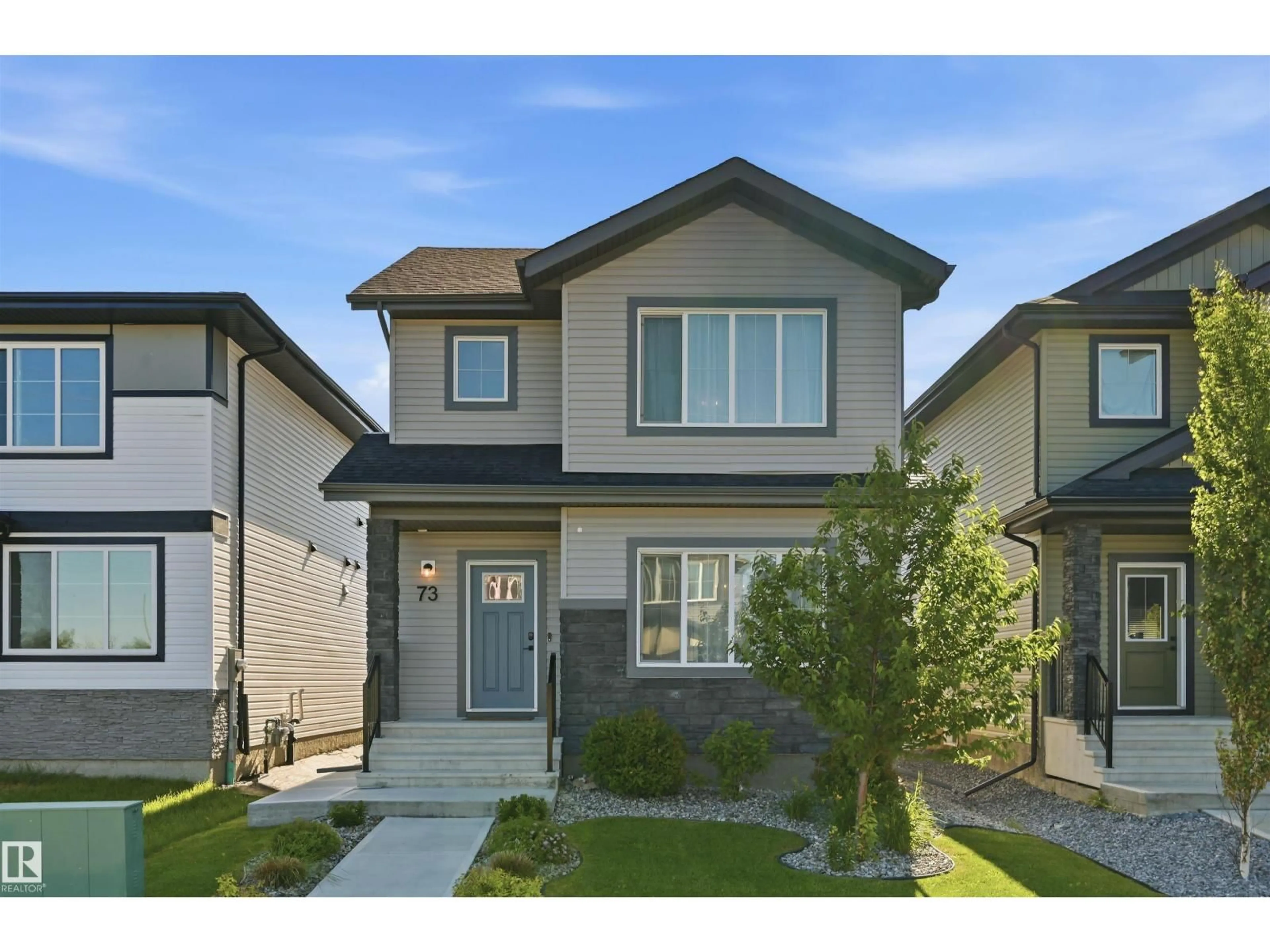 Home with vinyl exterior material, street for 73 WILTREE TC, Fort Saskatchewan Alberta T8L0X6