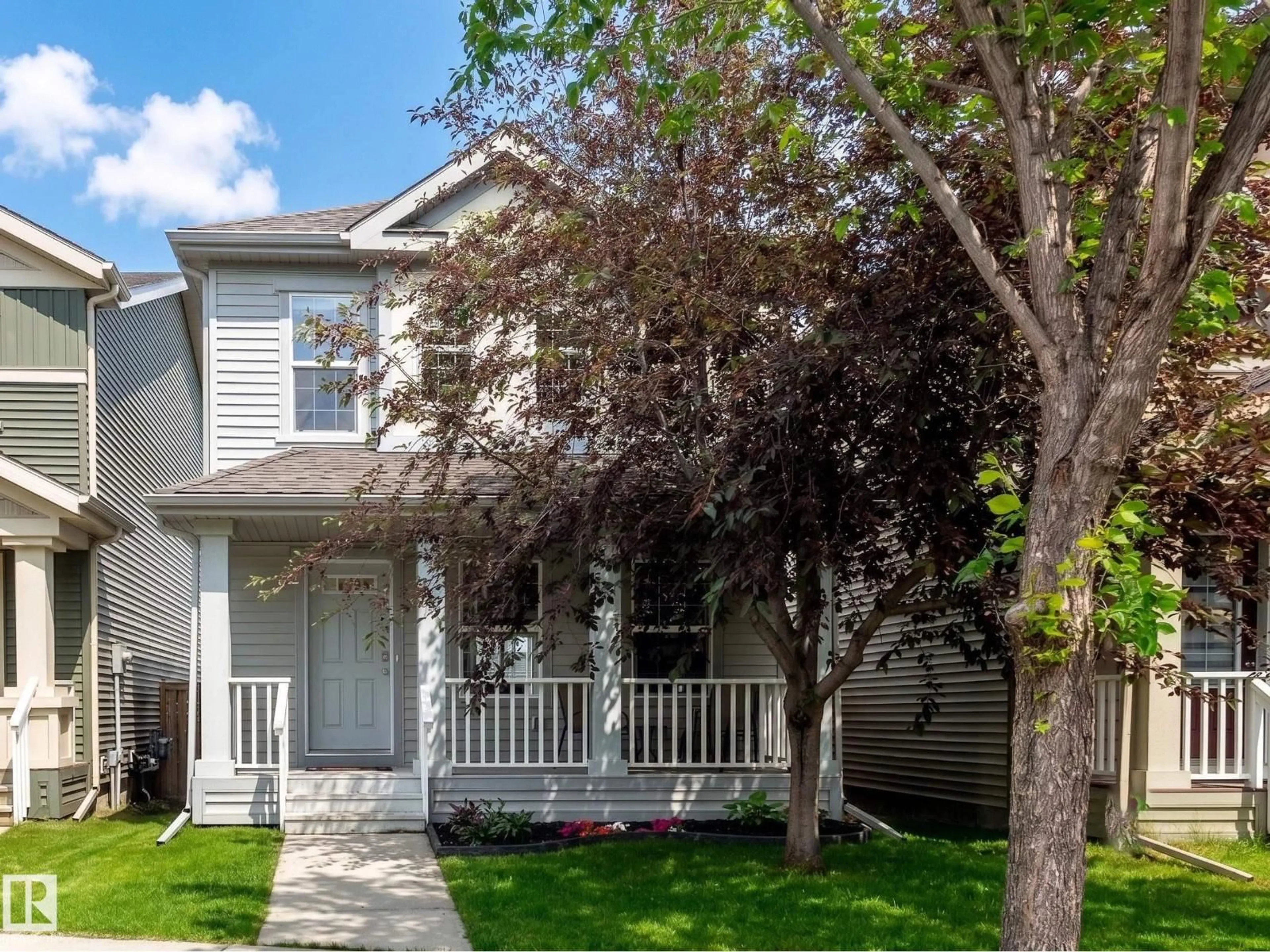 Home with vinyl exterior material, street for 8531 ELLIS LI, Edmonton Alberta T6M0P5