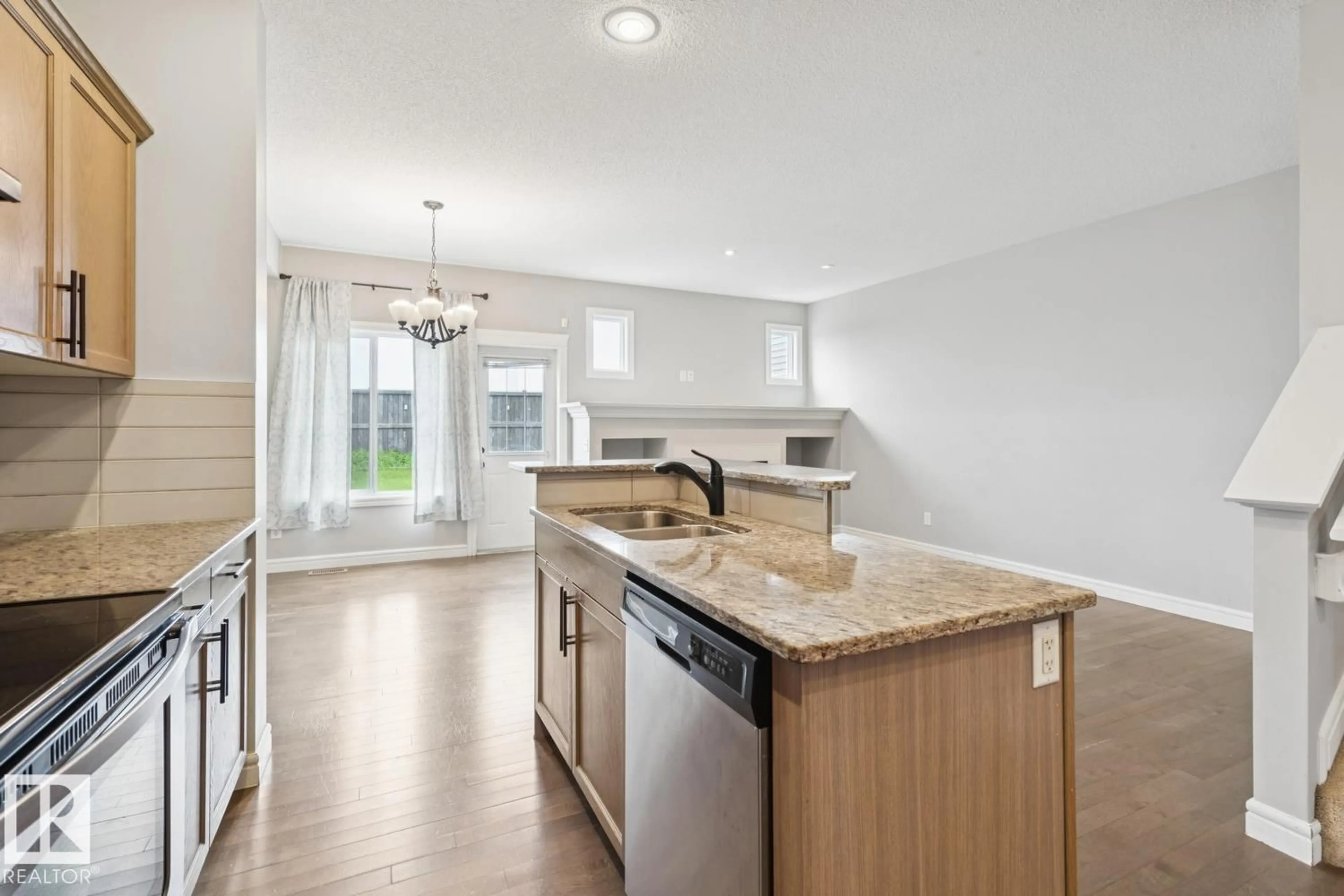 Open concept kitchen, unknown for NW - 17011 38 ST, Edmonton Alberta T5Y3S2