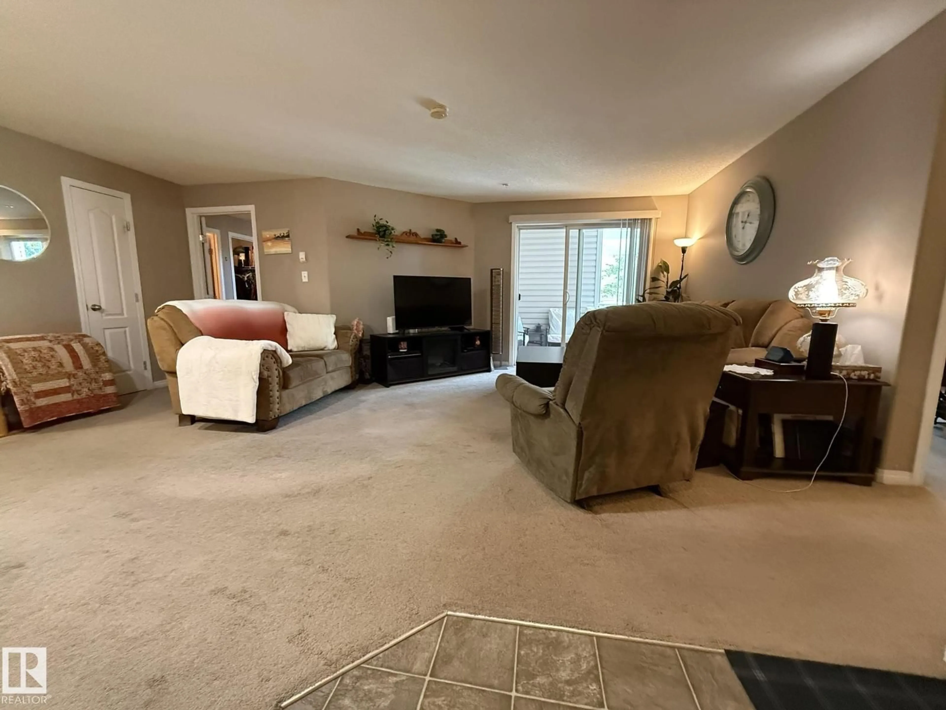 Living room with furniture, unknown for 205 - 3425 19 ST, Edmonton Alberta T6T2B5