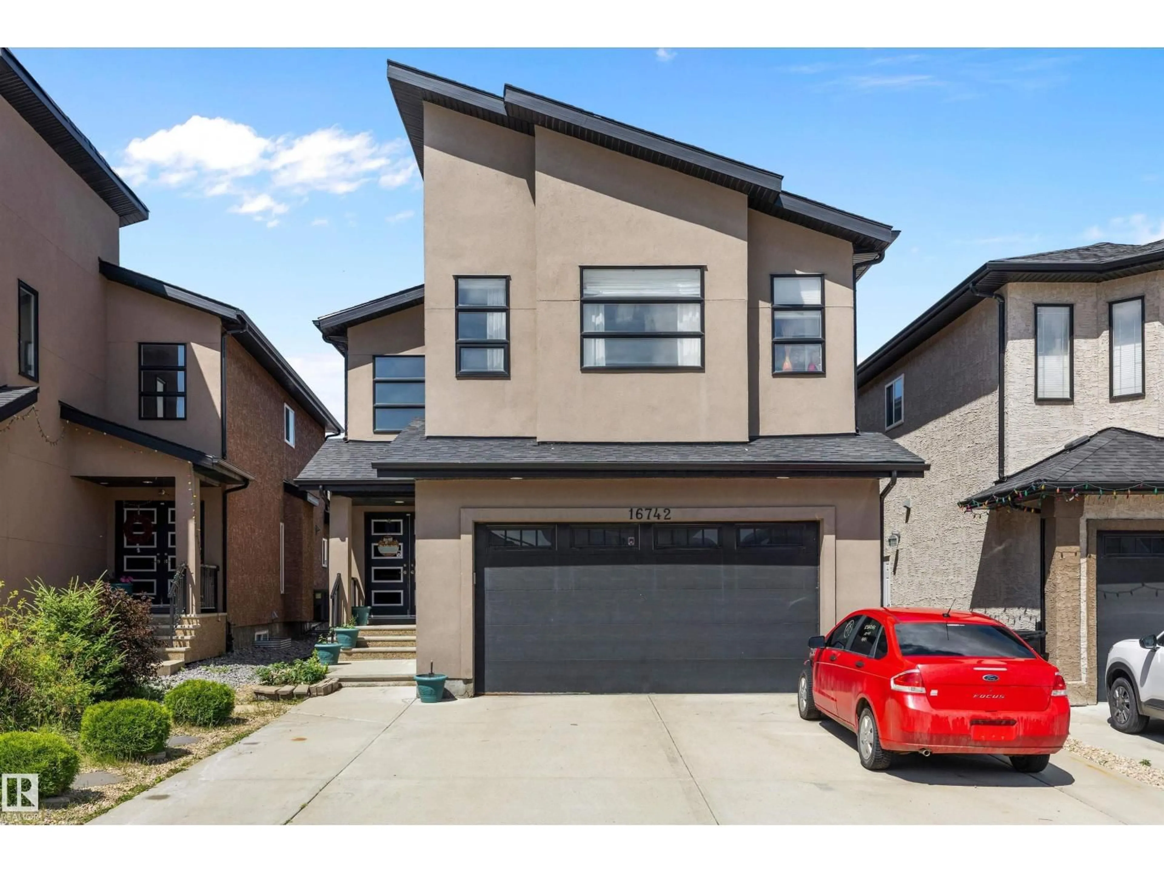 Home with brick exterior material, street for NW - 16742 61 ST, Edmonton Alberta T5Y0W7