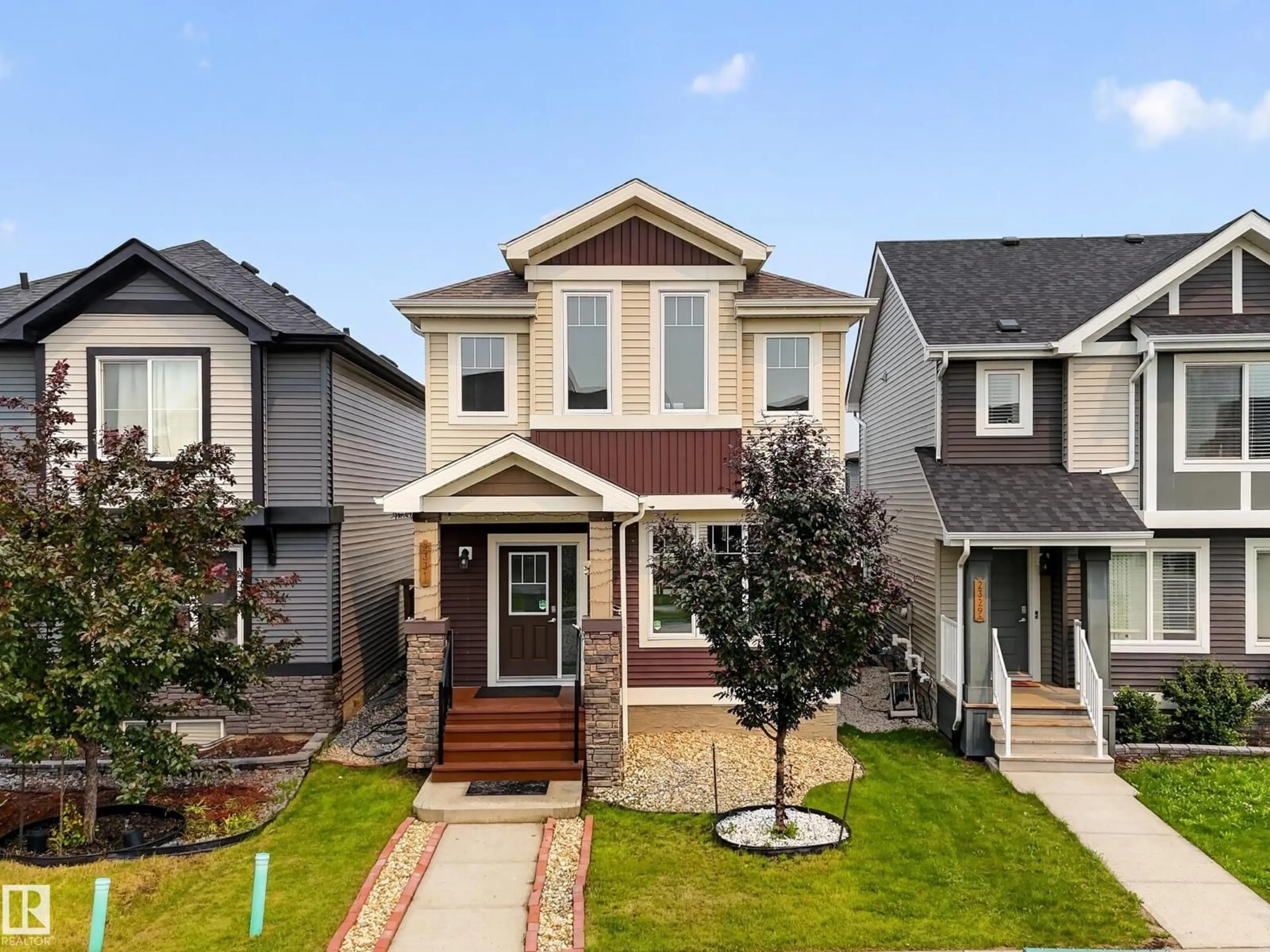 Home with vinyl exterior material, street for 2331 CASEY CR, Edmonton Alberta T6W3M9