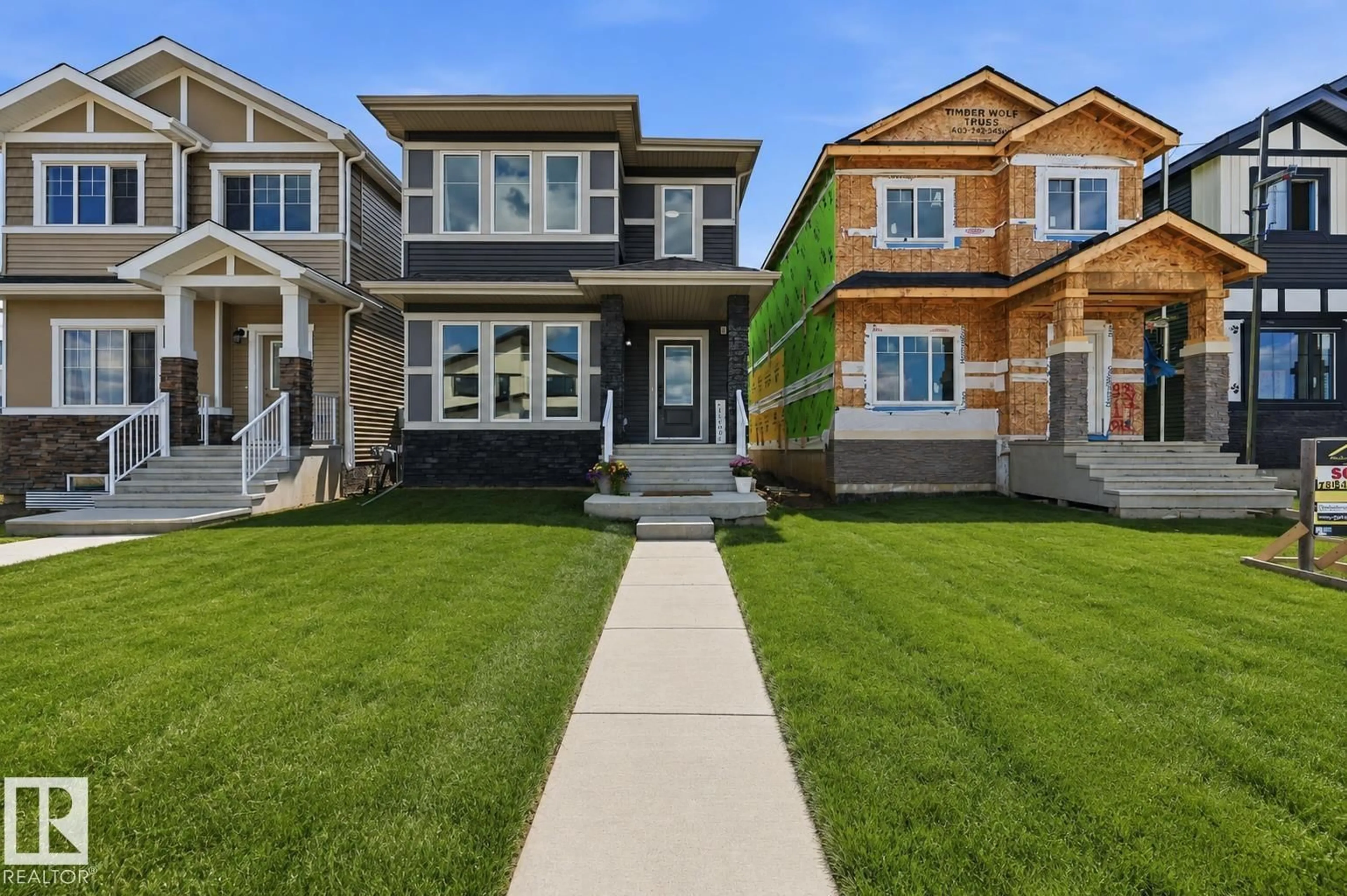 Home with vinyl exterior material, street for 9815 107A AV, Morinville Alberta T8R2R2