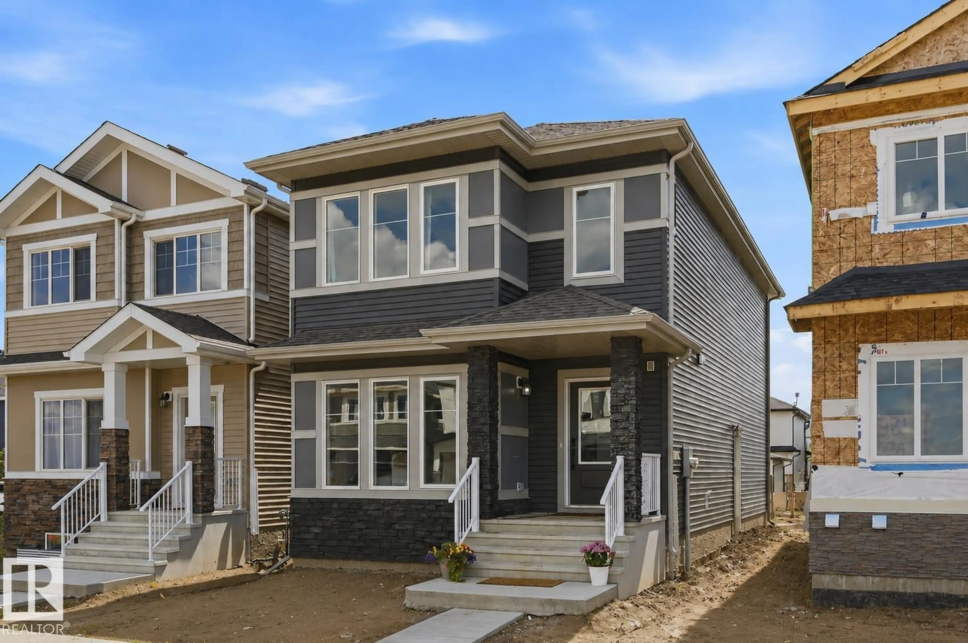 Home with vinyl exterior material, street for 9815 107A AV, Morinville Alberta T8R2R2