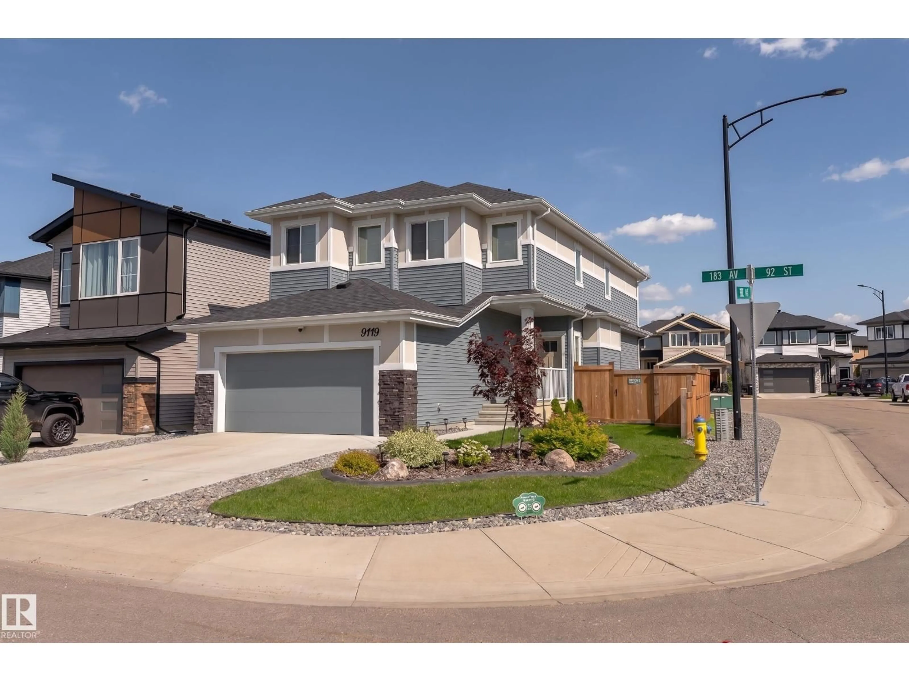 Home with vinyl exterior material, street for 9119 183 AV, Edmonton Alberta T5Z0S6