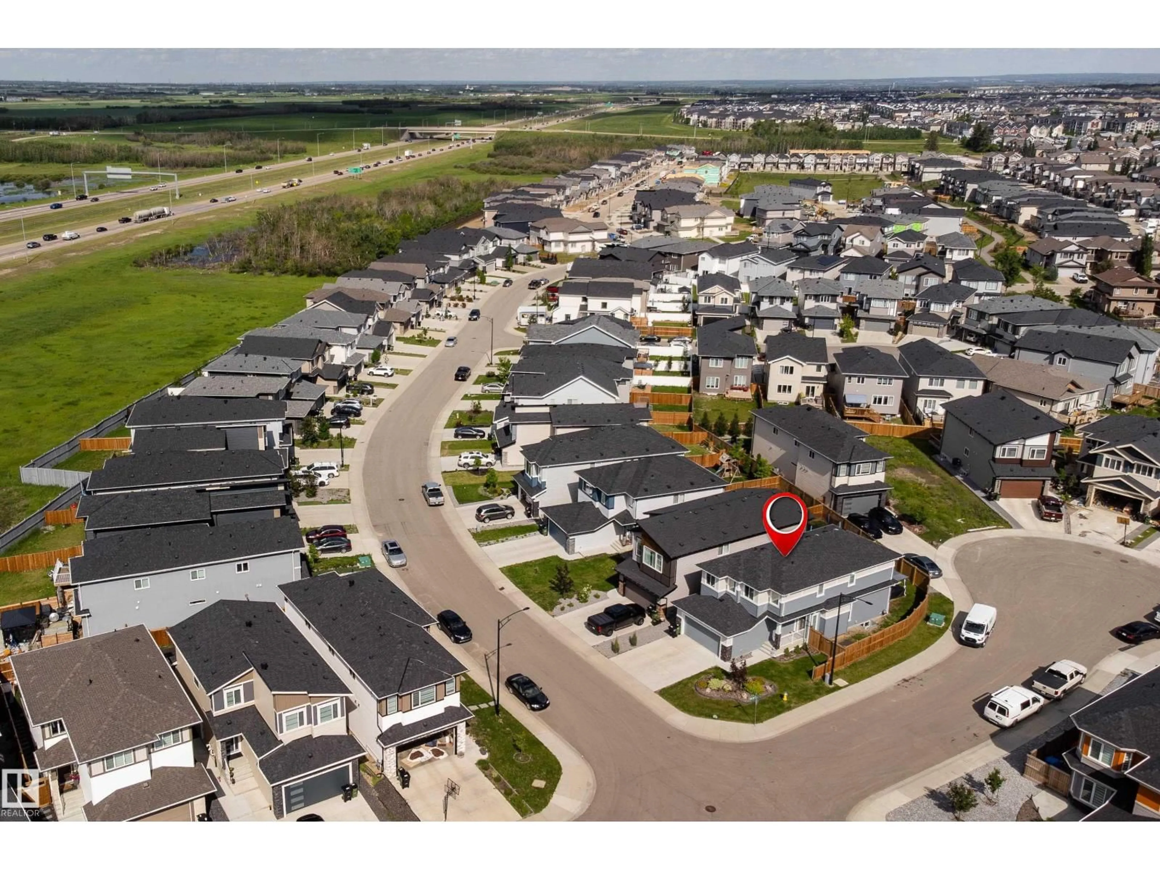 A pic from outside/outdoor area/front of a property/back of a property/a pic from drone, street for 9119 183 AV, Edmonton Alberta T5Z0S6