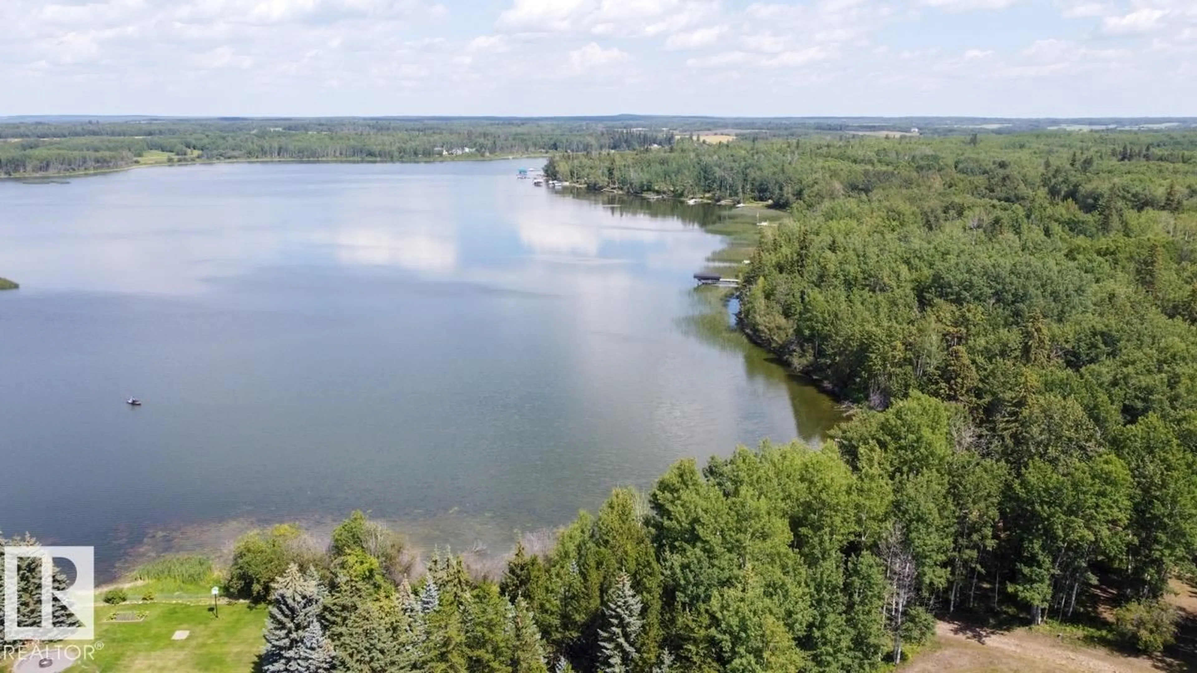 A pic from outside/outdoor area/front of a property/back of a property/a pic from drone, water/lake/river/ocean view for #103 - 2120 TWP ROAD 565, Rural Lac Ste. Anne County Alberta T0E1V0