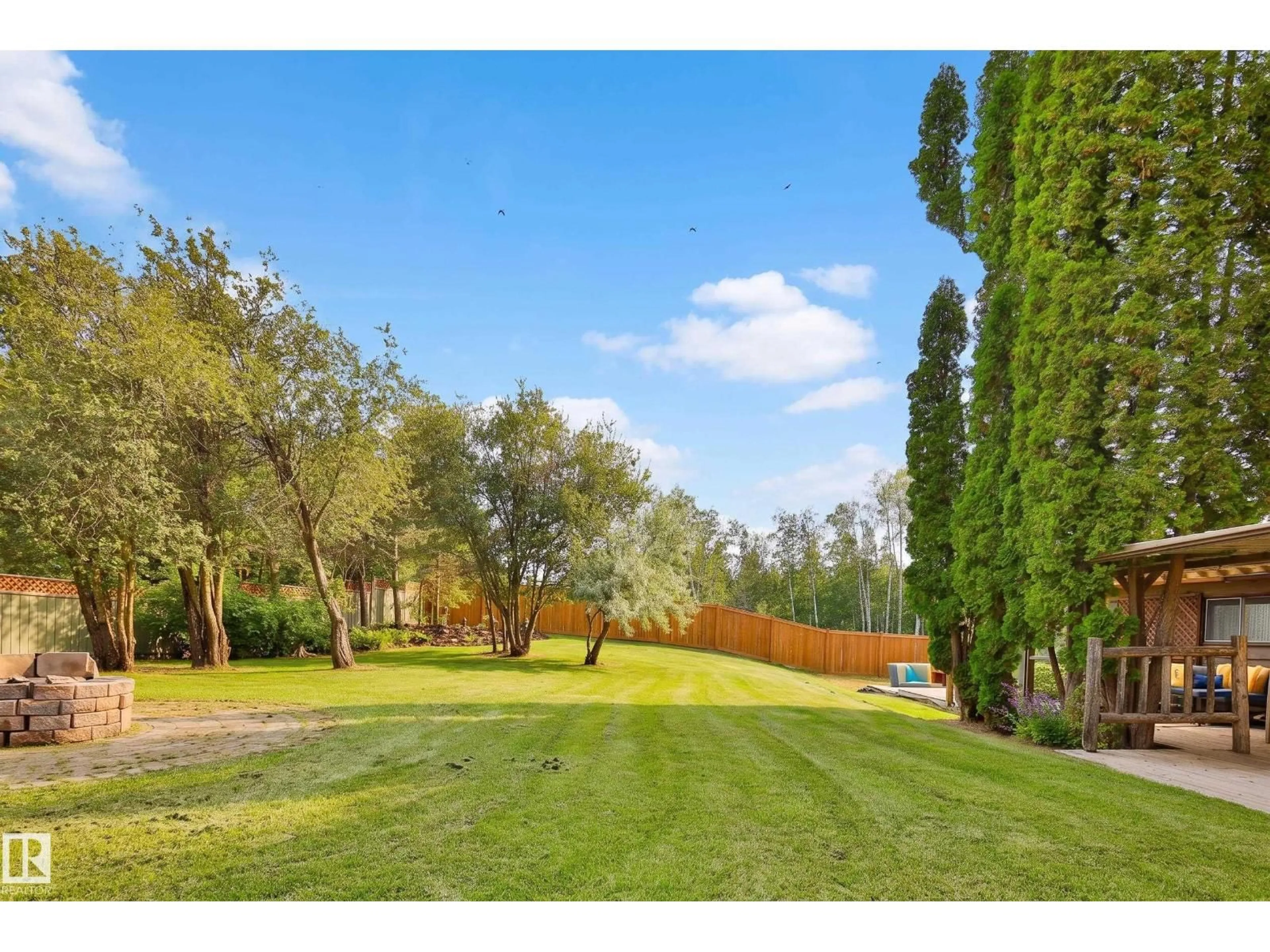 A pic from outside/outdoor area/front of a property/back of a property/a pic from drone, forest/trees view for #103 - 2120 TWP ROAD 565, Rural Lac Ste. Anne County Alberta T0E1V0
