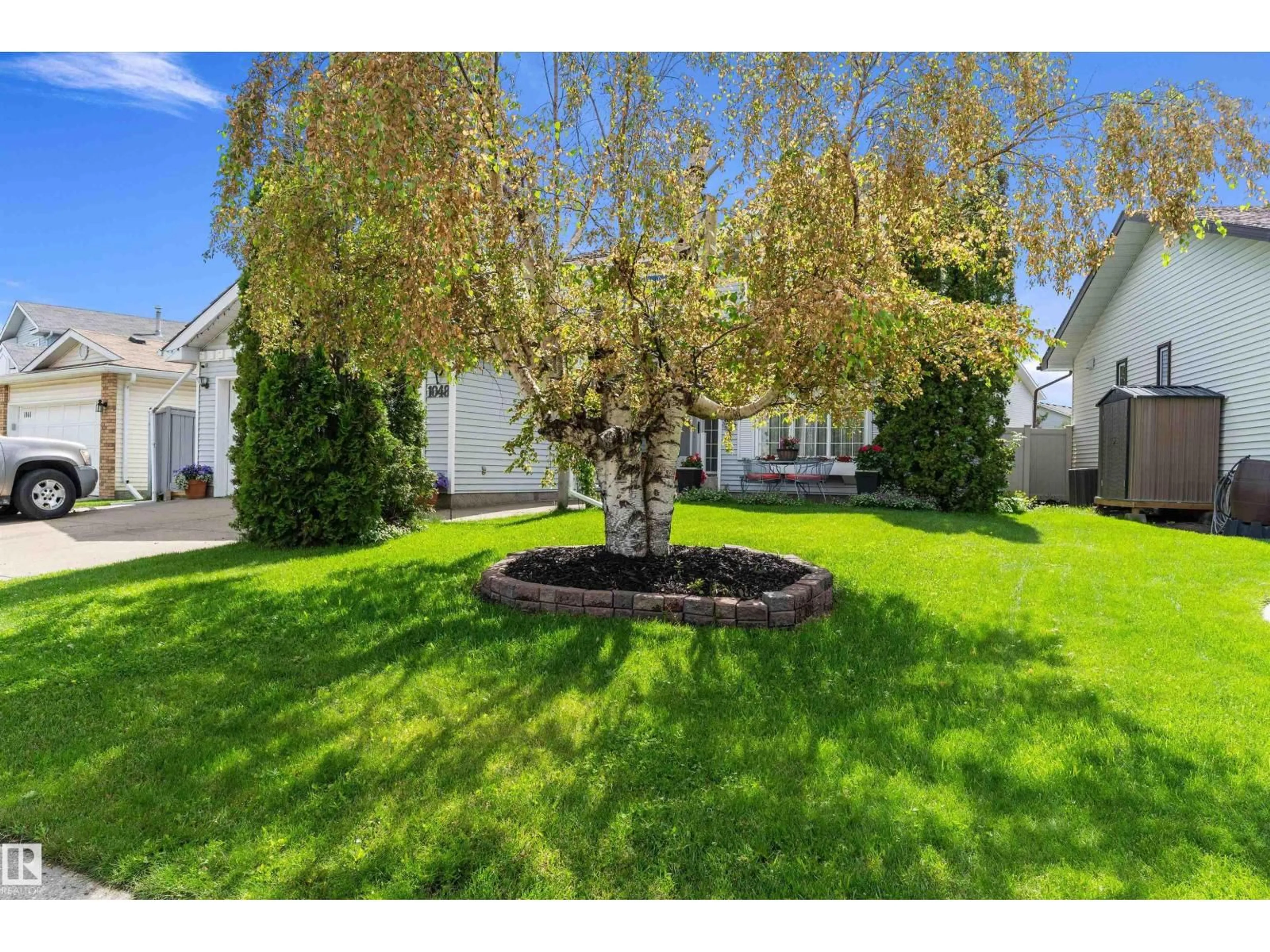 A pic from outside/outdoor area/front of a property/back of a property/a pic from drone, street for 1048 105 ST, Edmonton Alberta T6J6G5