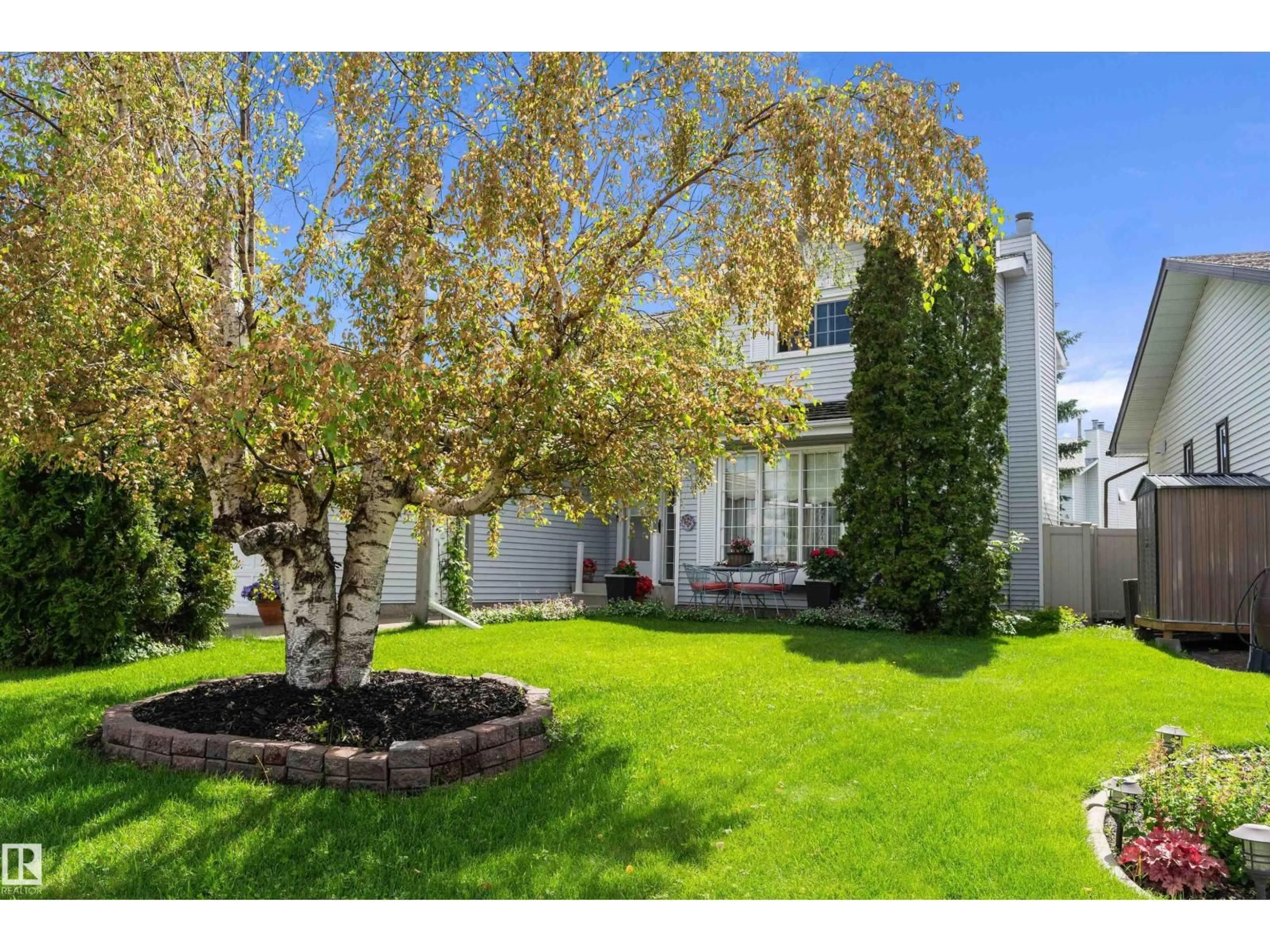 A pic from outside/outdoor area/front of a property/back of a property/a pic from drone, street for 1048 105 ST, Edmonton Alberta T6J6G5