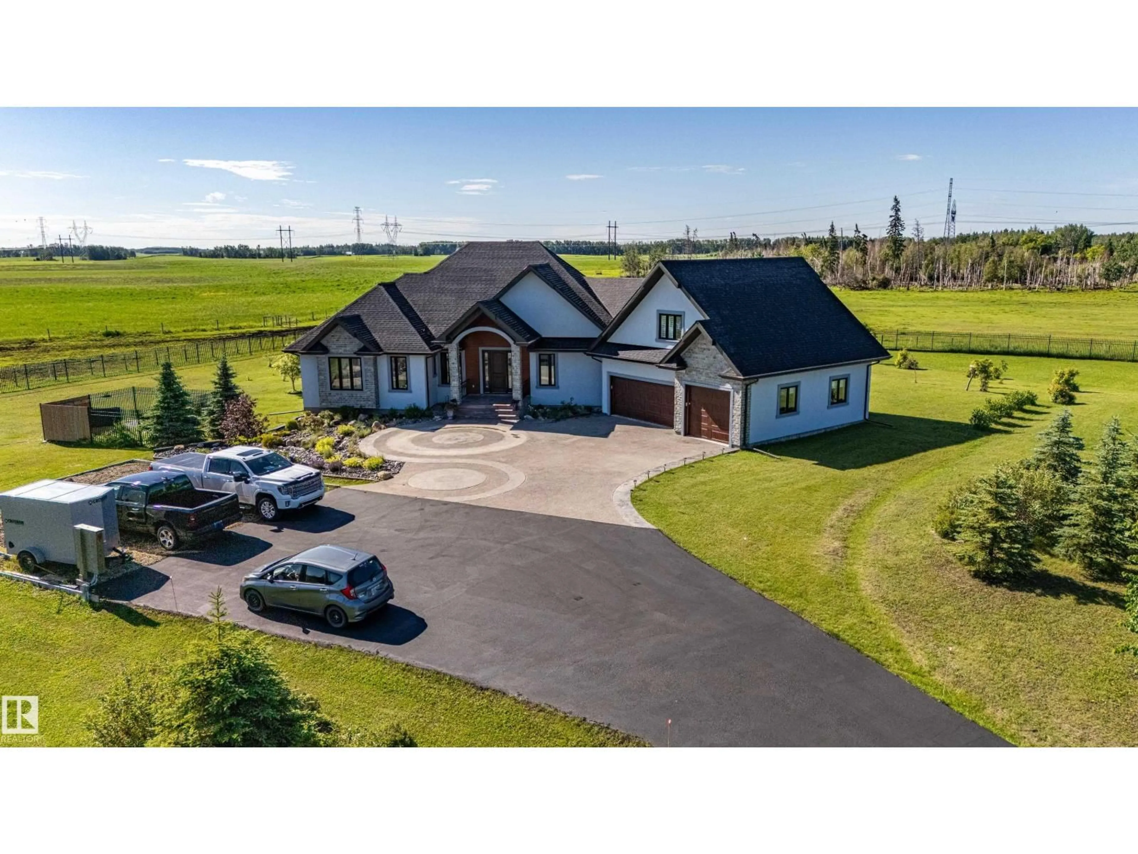 A pic from outside/outdoor area/front of a property/back of a property/a pic from drone, street for 52025 RGE ROAD 272, Rural Parkland County Alberta T7X3N1