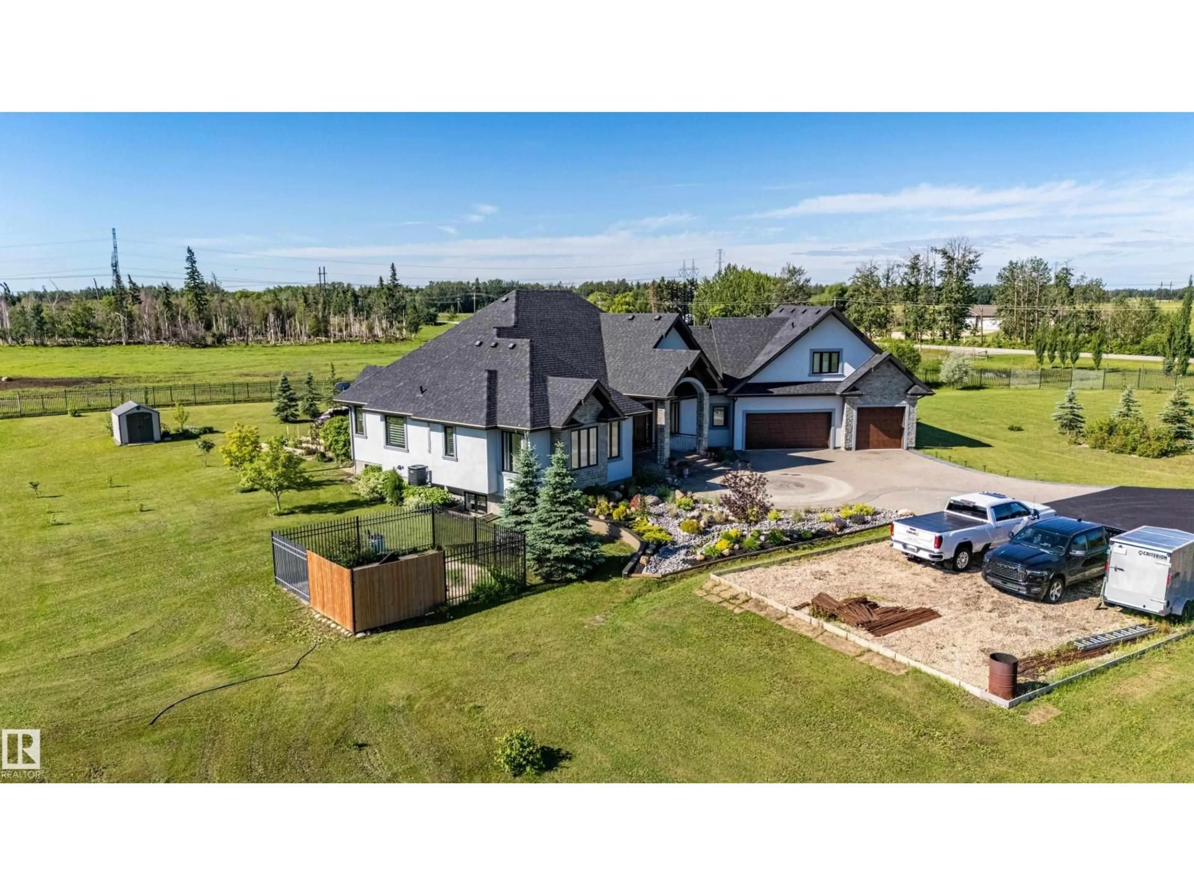 A pic from outside/outdoor area/front of a property/back of a property/a pic from drone, unknown for 52025 RGE ROAD 272, Rural Parkland County Alberta T7X3N1