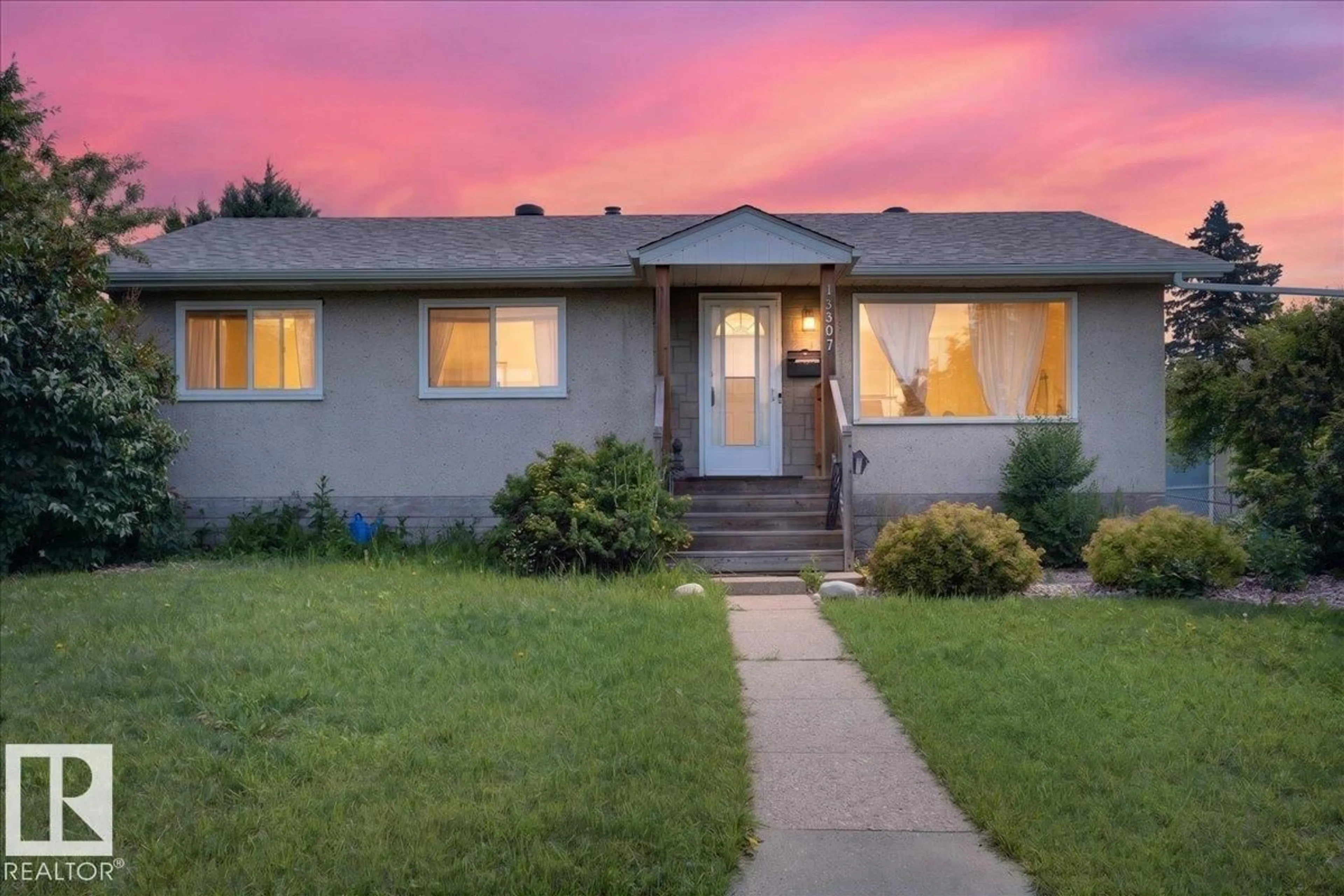 Home with vinyl exterior material, street for 13307 122 ST, Edmonton Alberta T5L0G4