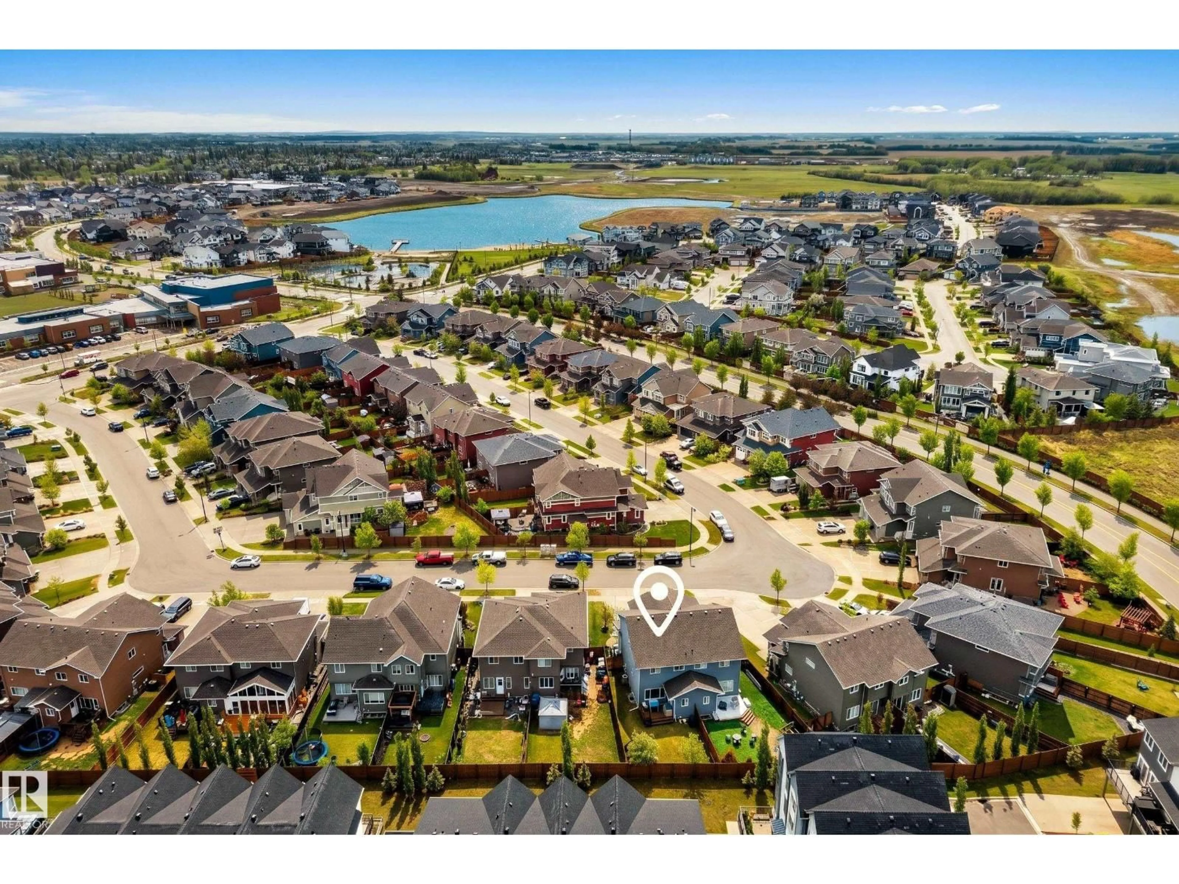 A pic from outside/outdoor area/front of a property/back of a property/a pic from drone, water/lake/river/ocean view for 70 JAMES CR, St. Albert Alberta T8N7S5