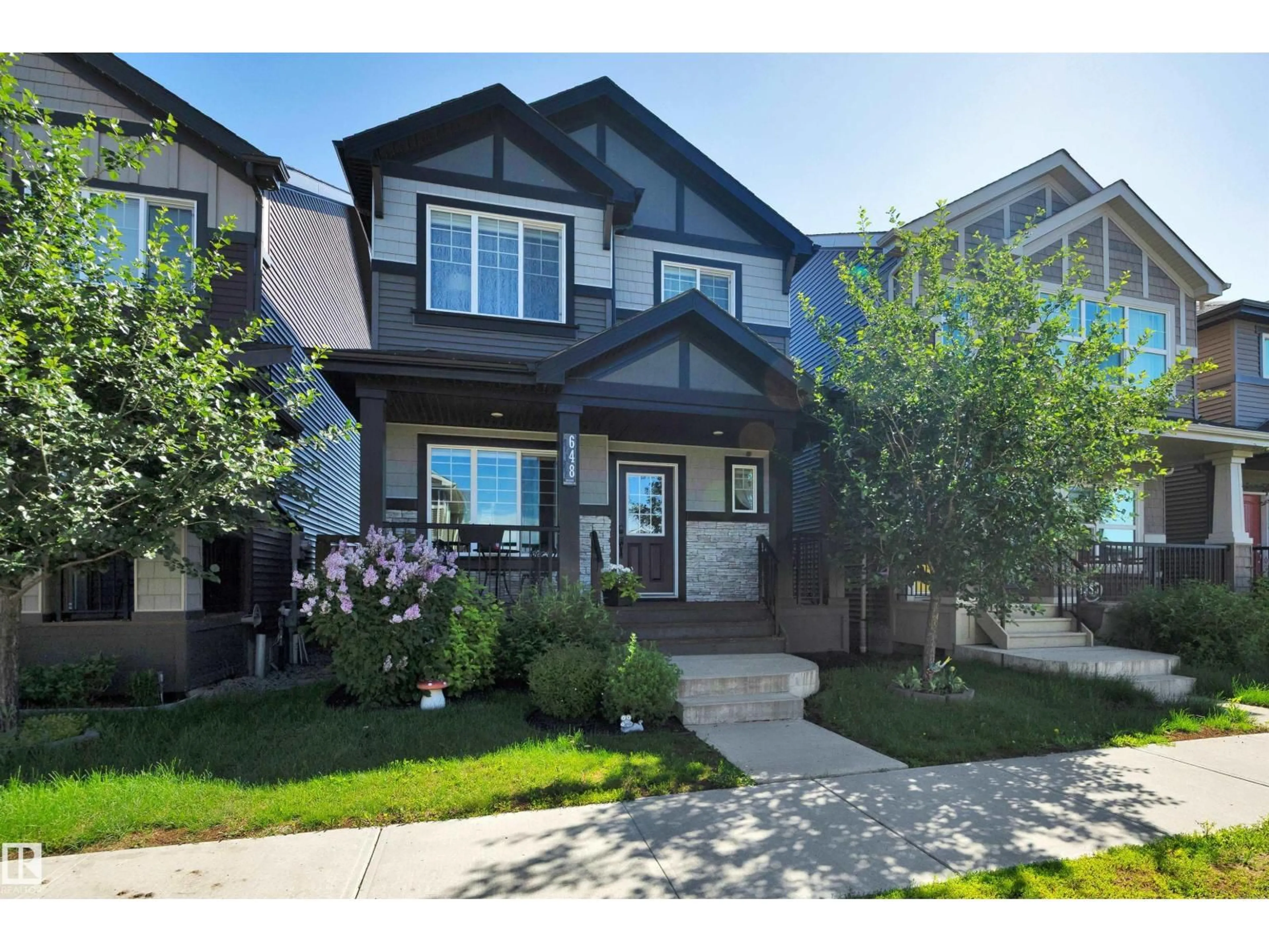 Home with vinyl exterior material, street for 648 ORCHARDS BV, Edmonton Alberta T6X2L4