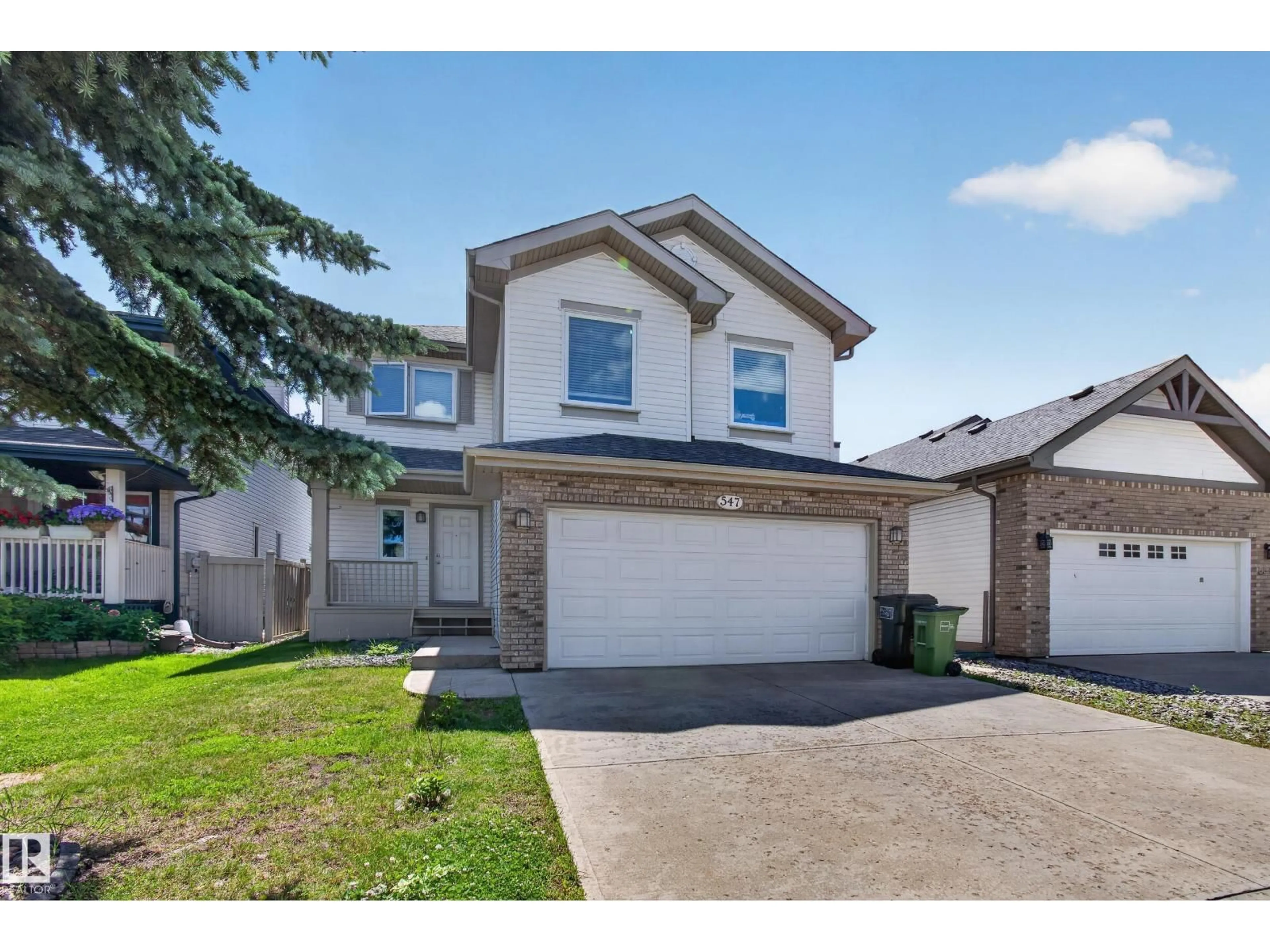 A pic from outside/outdoor area/front of a property/back of a property/a pic from drone, street for 547 LEGER WY, Edmonton Alberta T6R3T5