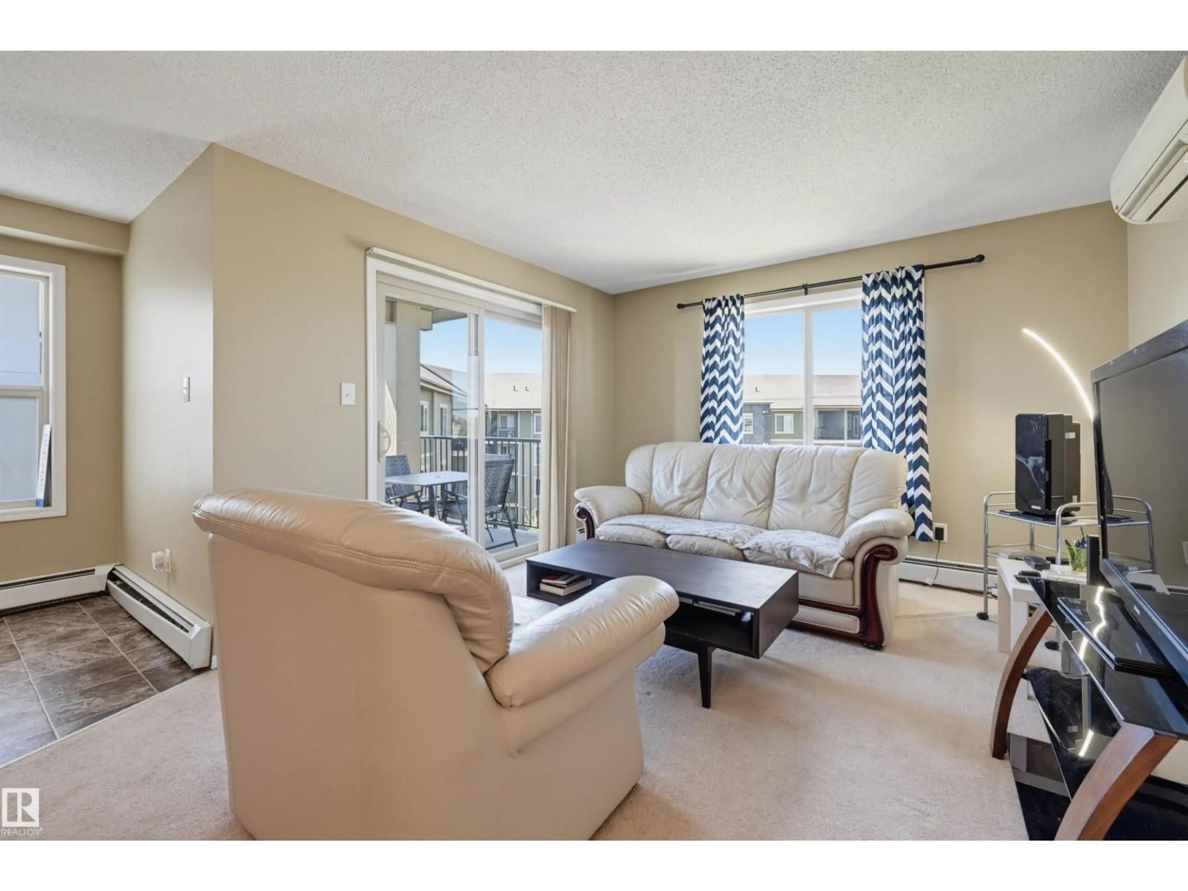 Living room with furniture, unknown for 274 - 424 MCCONACHIE DR, Edmonton Alberta T5Y3N4