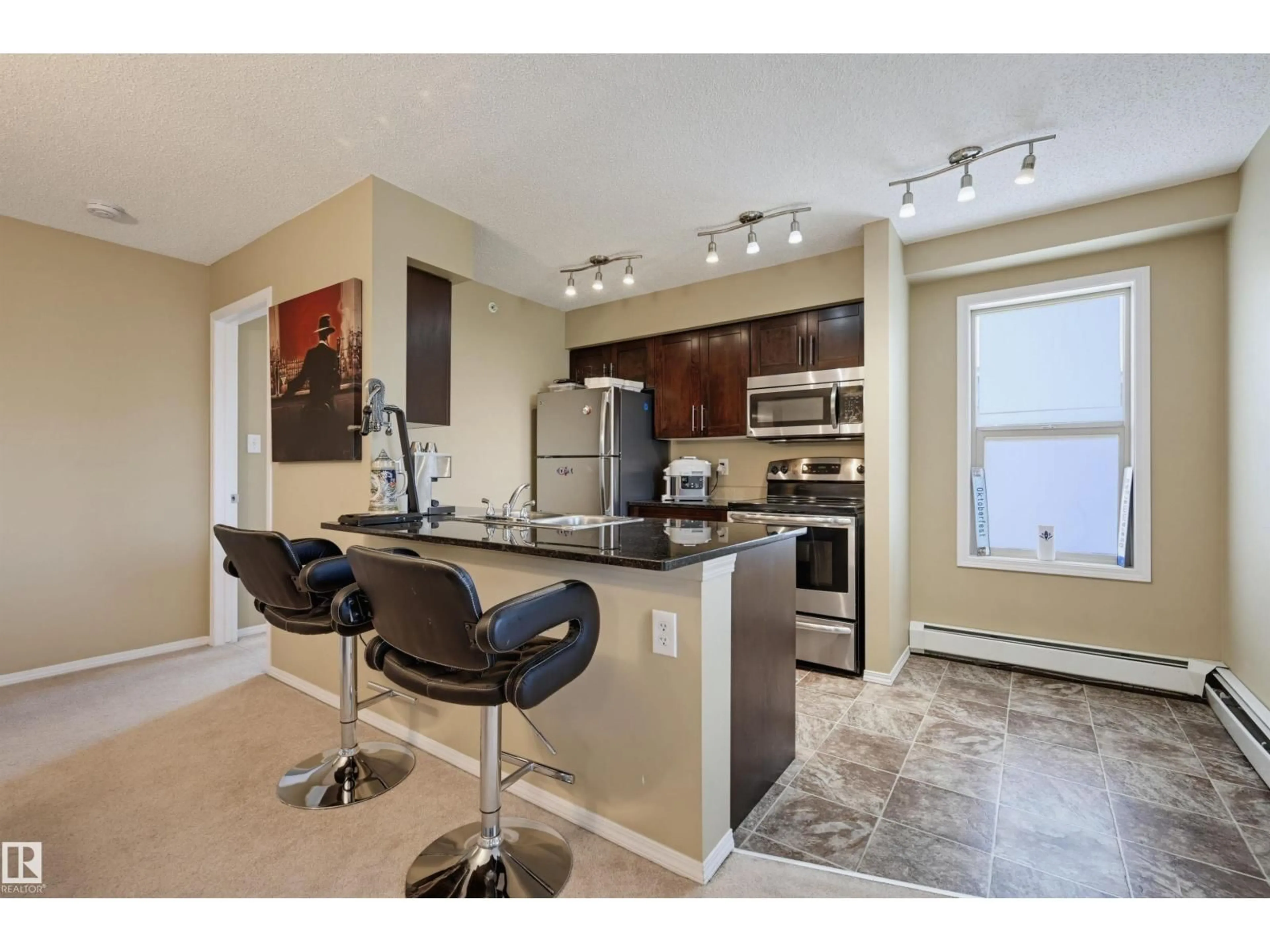 Open concept kitchen, unknown for 274 - 424 MCCONACHIE DR, Edmonton Alberta T5Y3N4