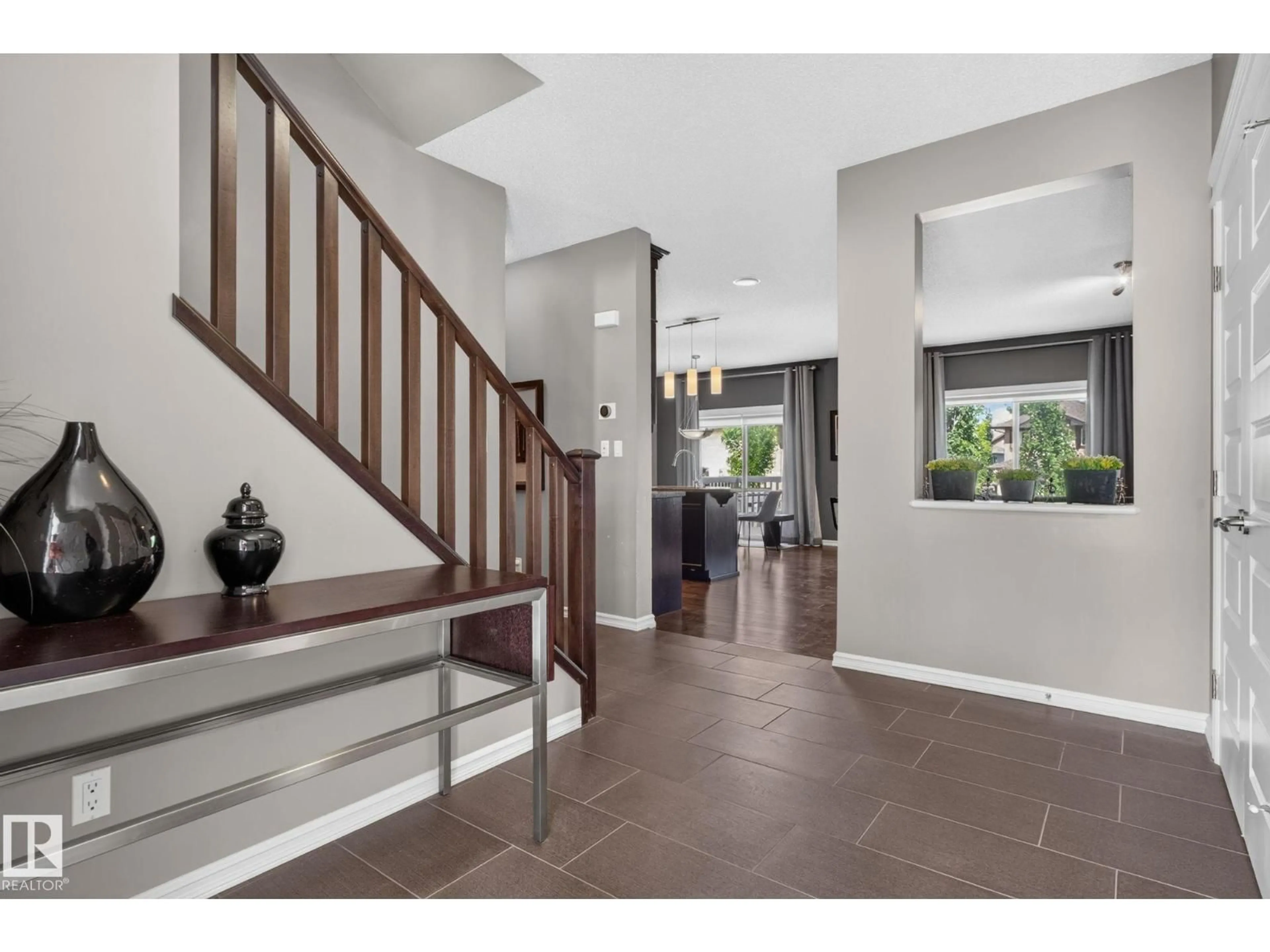 Indoor foyer for 3611 15A ST, Edmonton Alberta T6T0M4