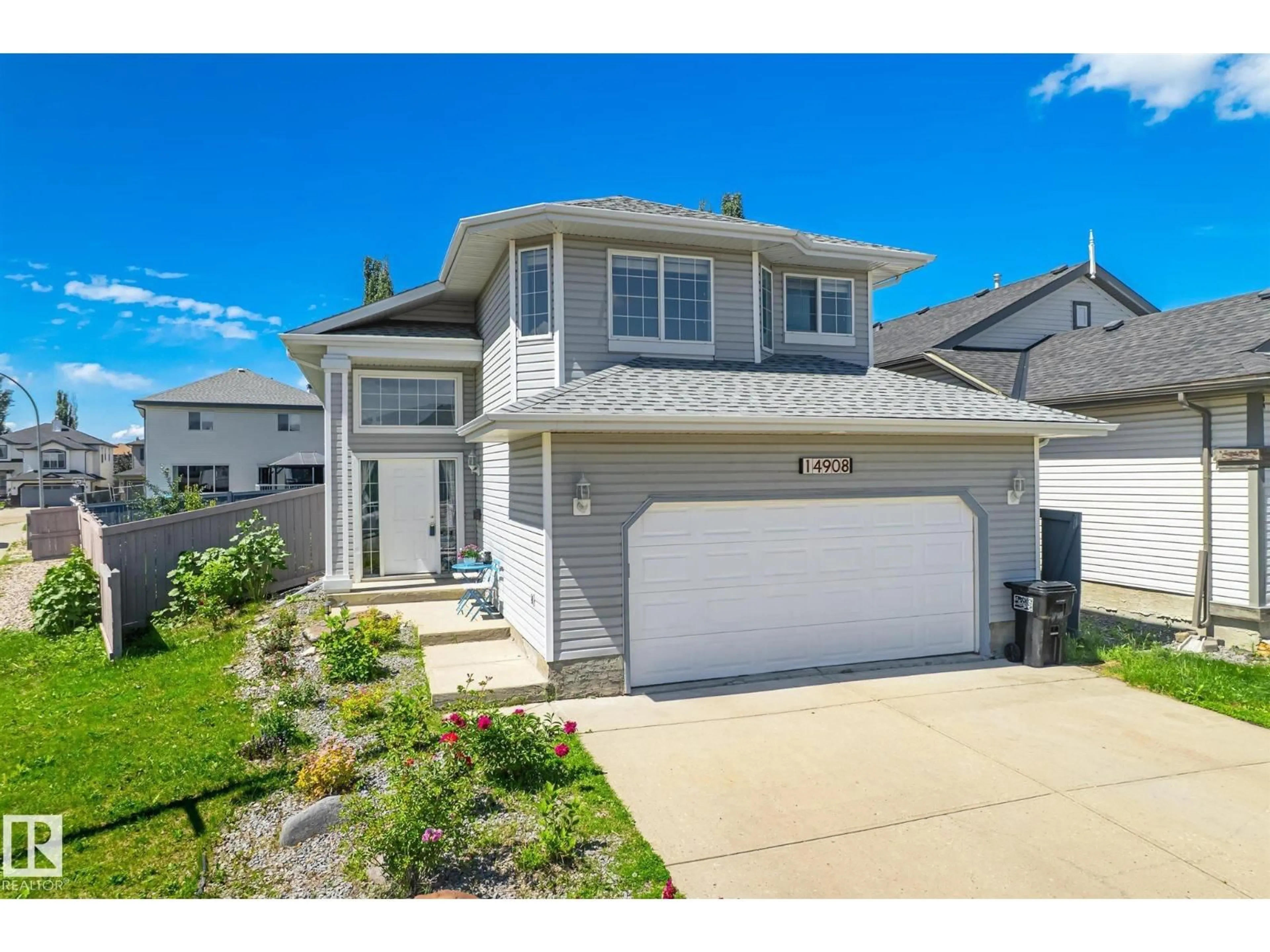 Home with vinyl exterior material, street for 14908 137 ST, Edmonton Alberta T6V1R2