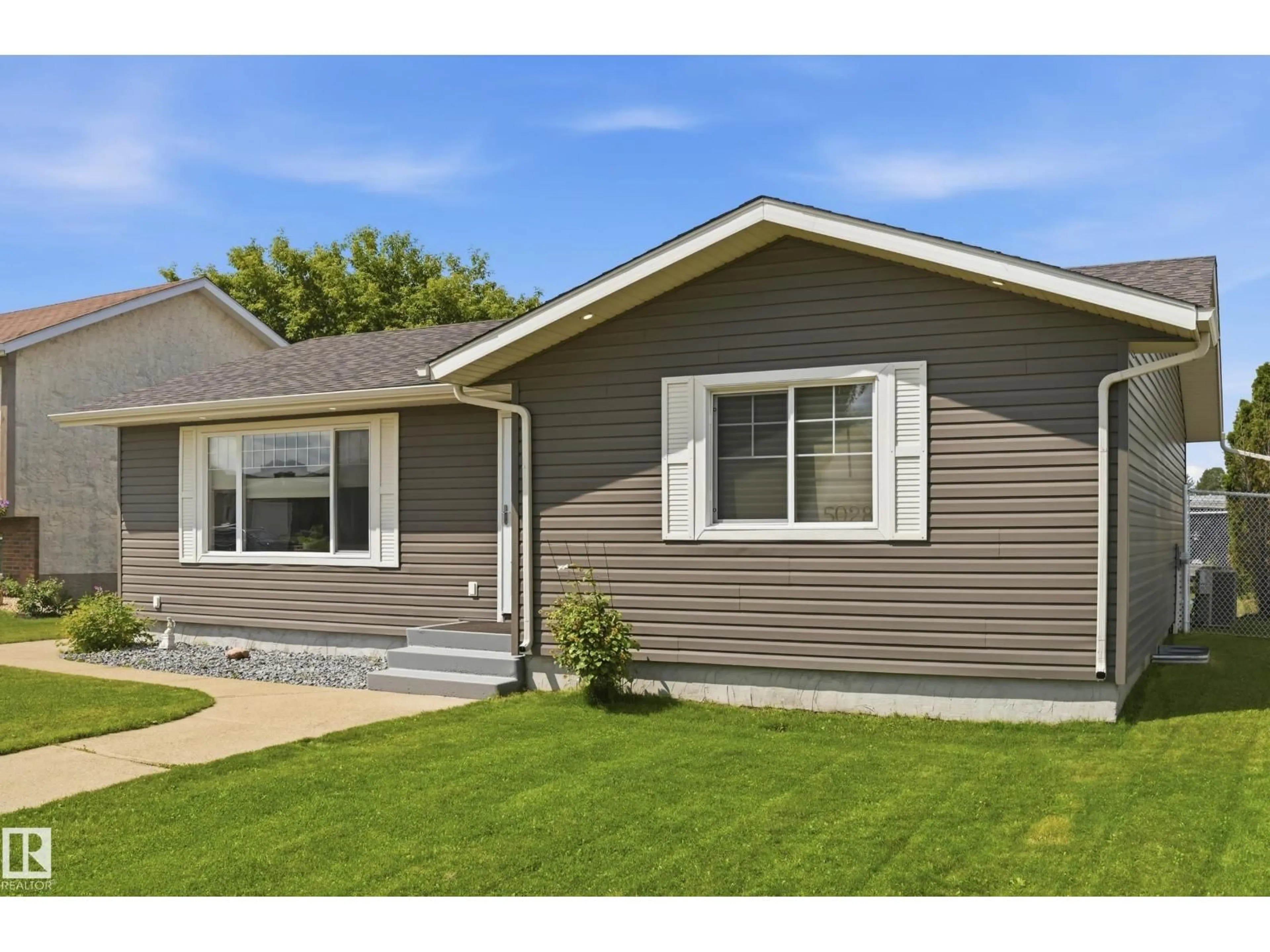 Home with vinyl exterior material, street for 5028 47 ST, Lamont Alberta T0B2R0