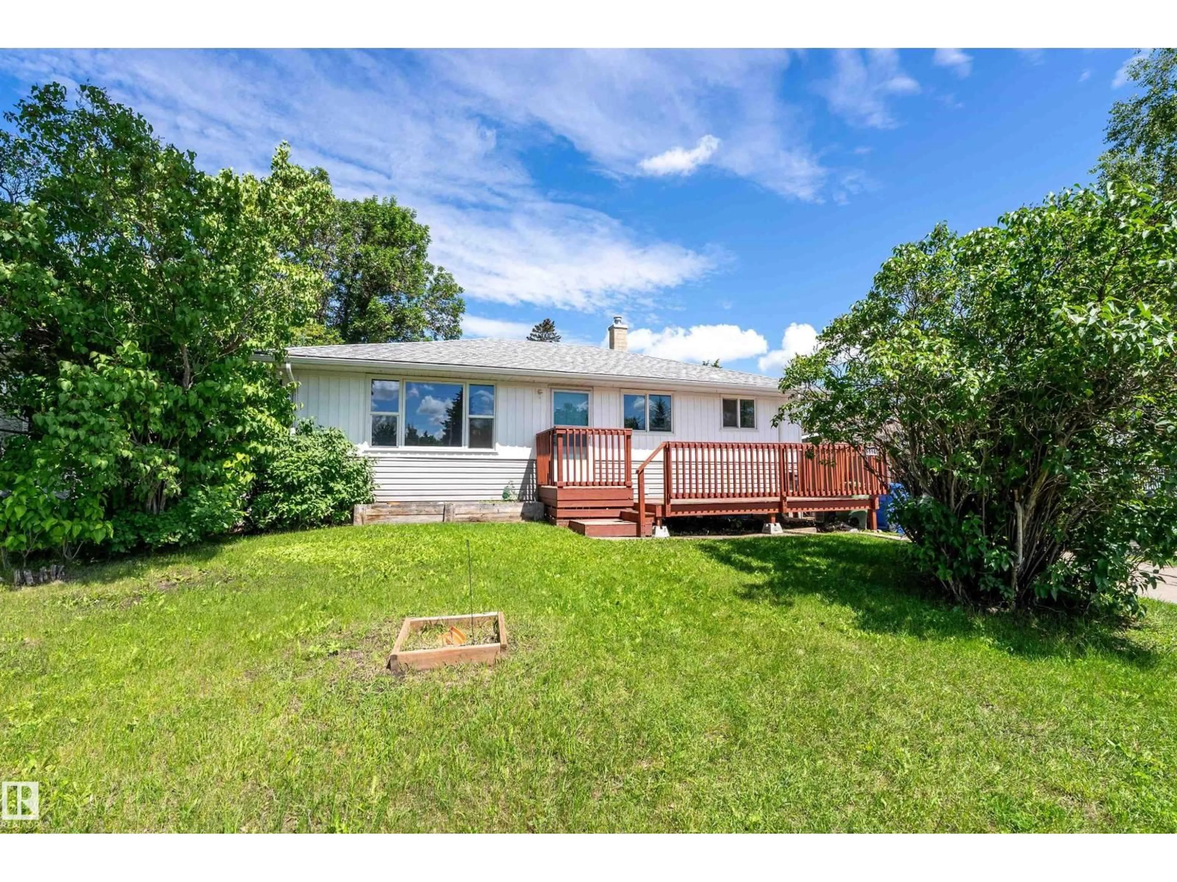 A pic from outside/outdoor area/front of a property/back of a property/a pic from drone, water/lake/river/ocean view for 5516 47A AV, Wetaskiwin Alberta T9A0M1