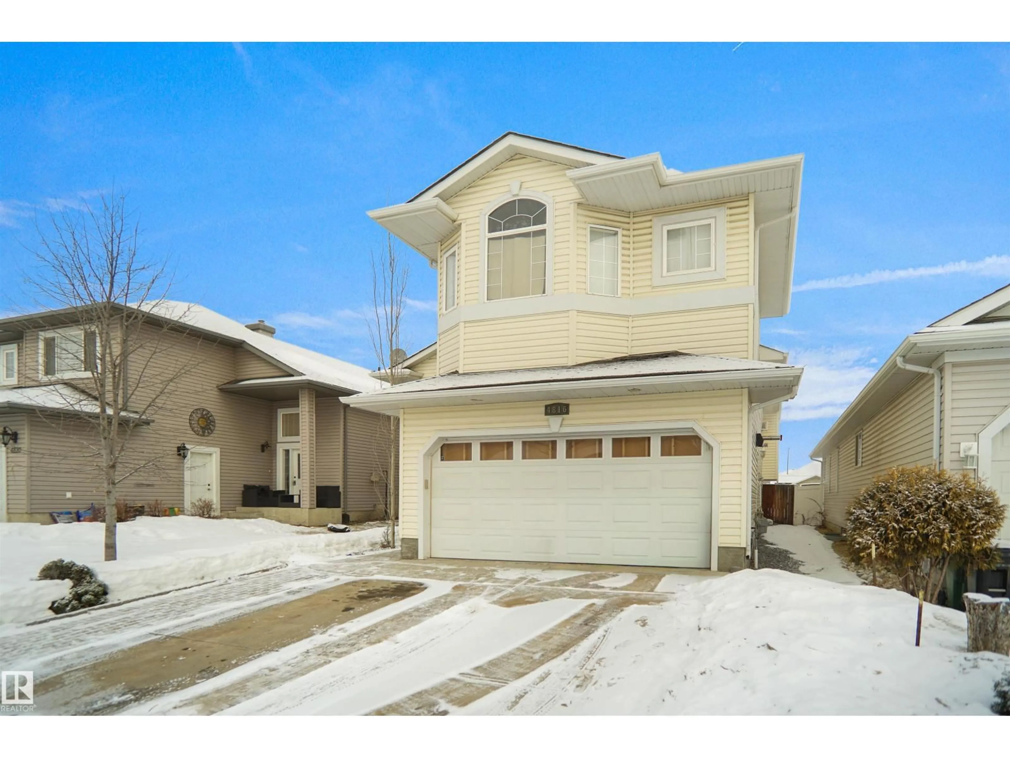 Home with vinyl exterior material, street for 4816 155 AVE, Edmonton Alberta T5Y0B9
