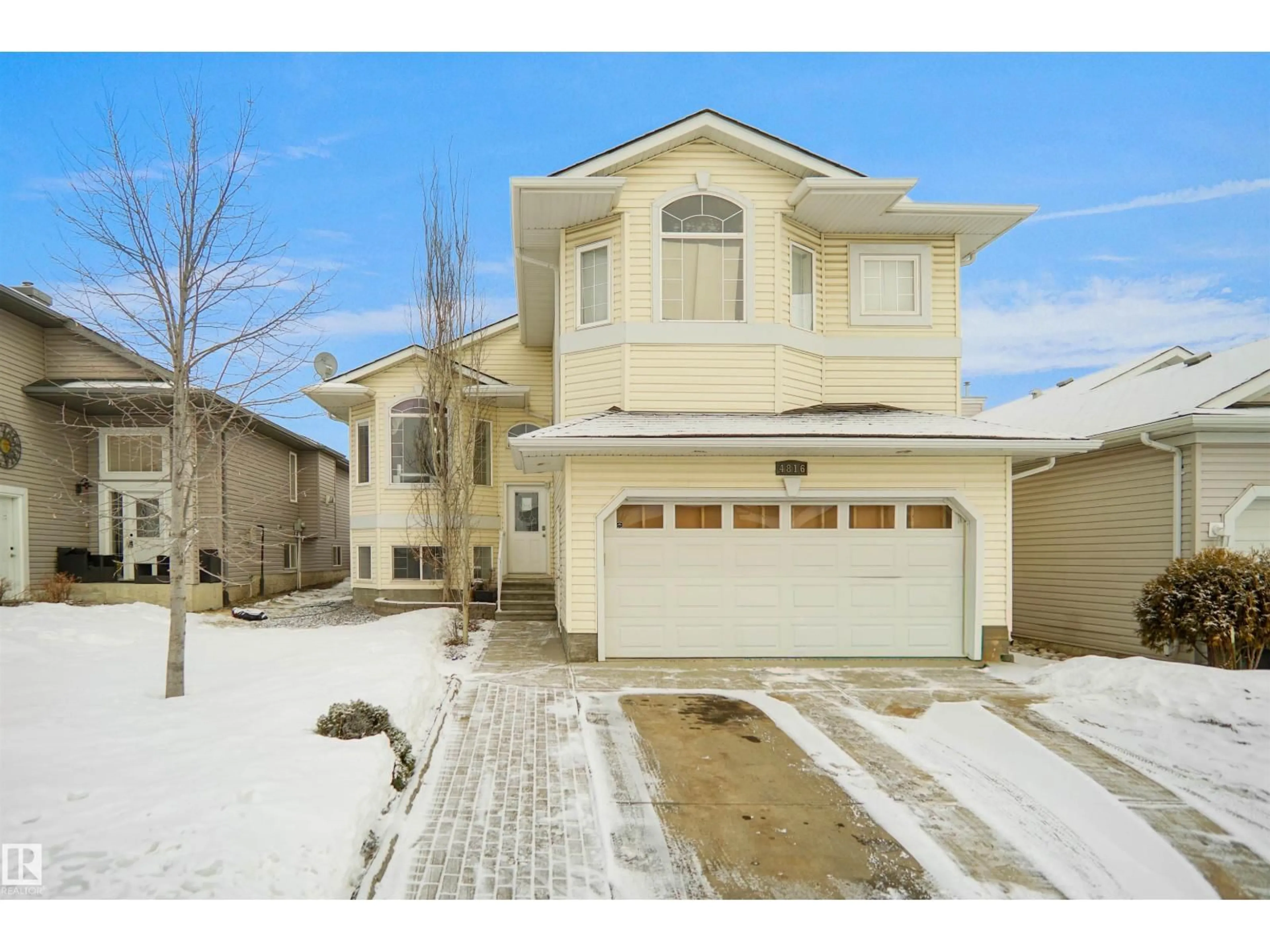 Home with vinyl exterior material, street for 4816 155 AVE, Edmonton Alberta T5Y0B9