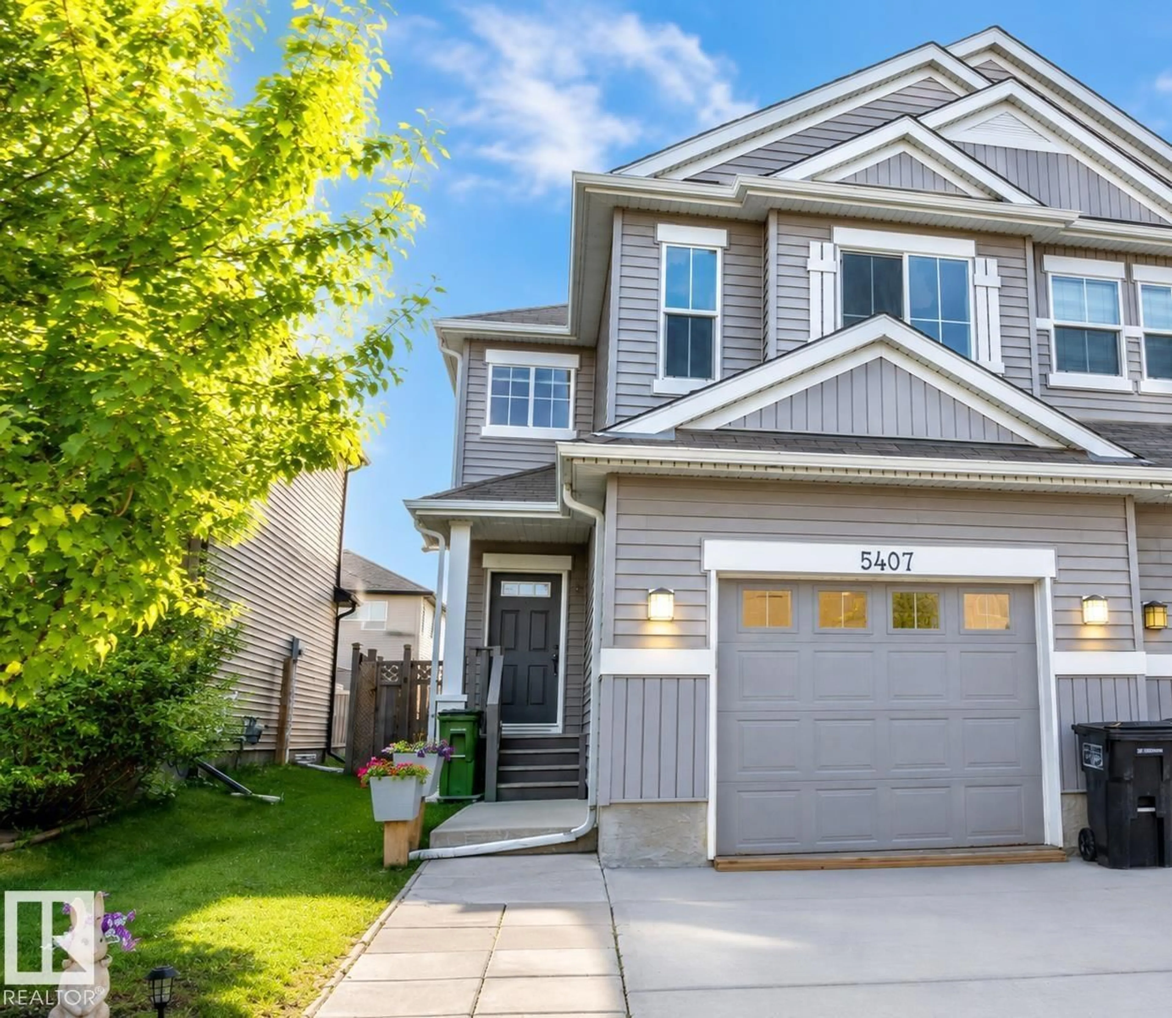 Home with vinyl exterior material, street for 5407 14 AV, Edmonton Alberta T6X1S2