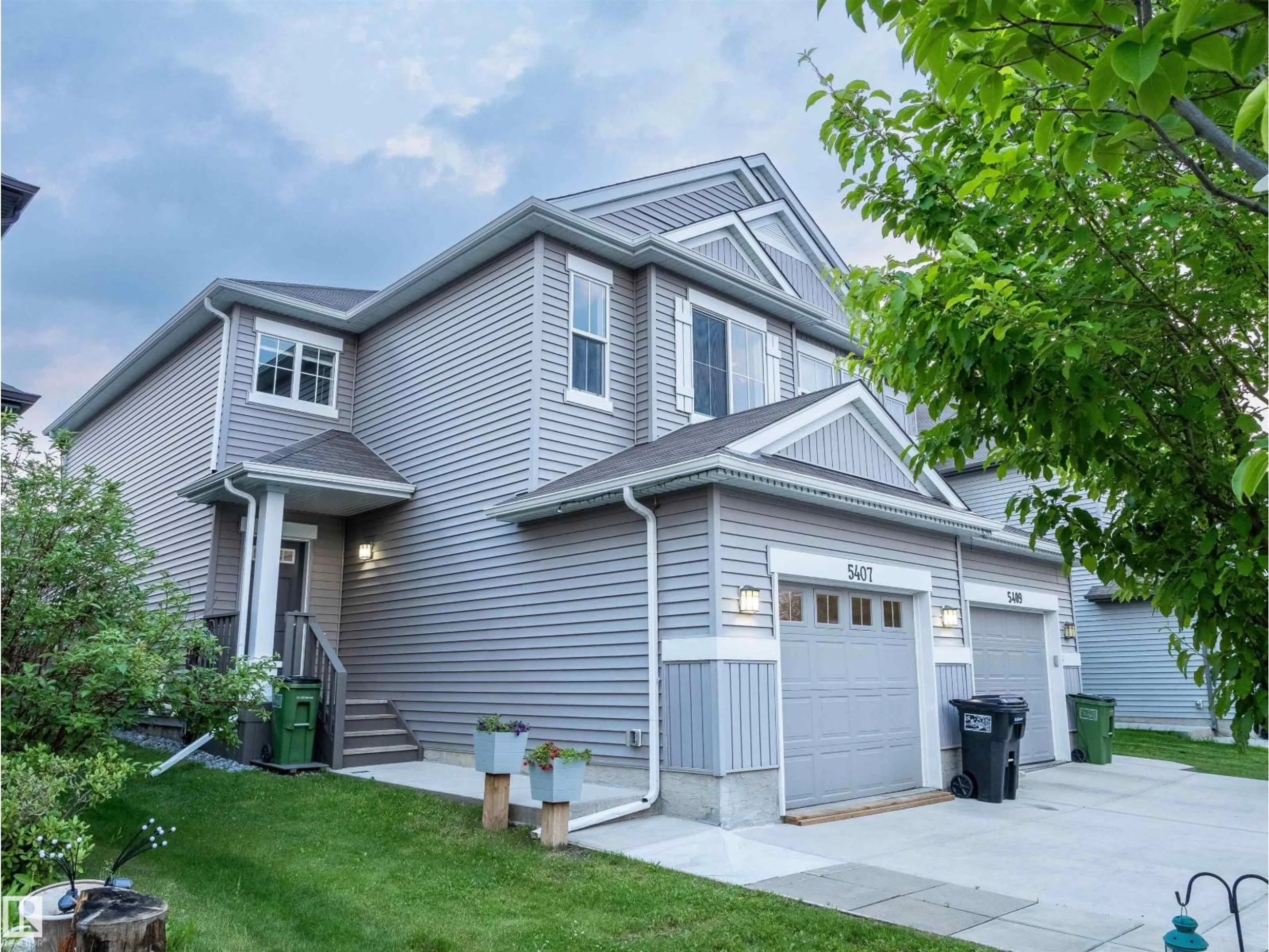 Home with vinyl exterior material, street for 5407 14 AV, Edmonton Alberta T6X1S2