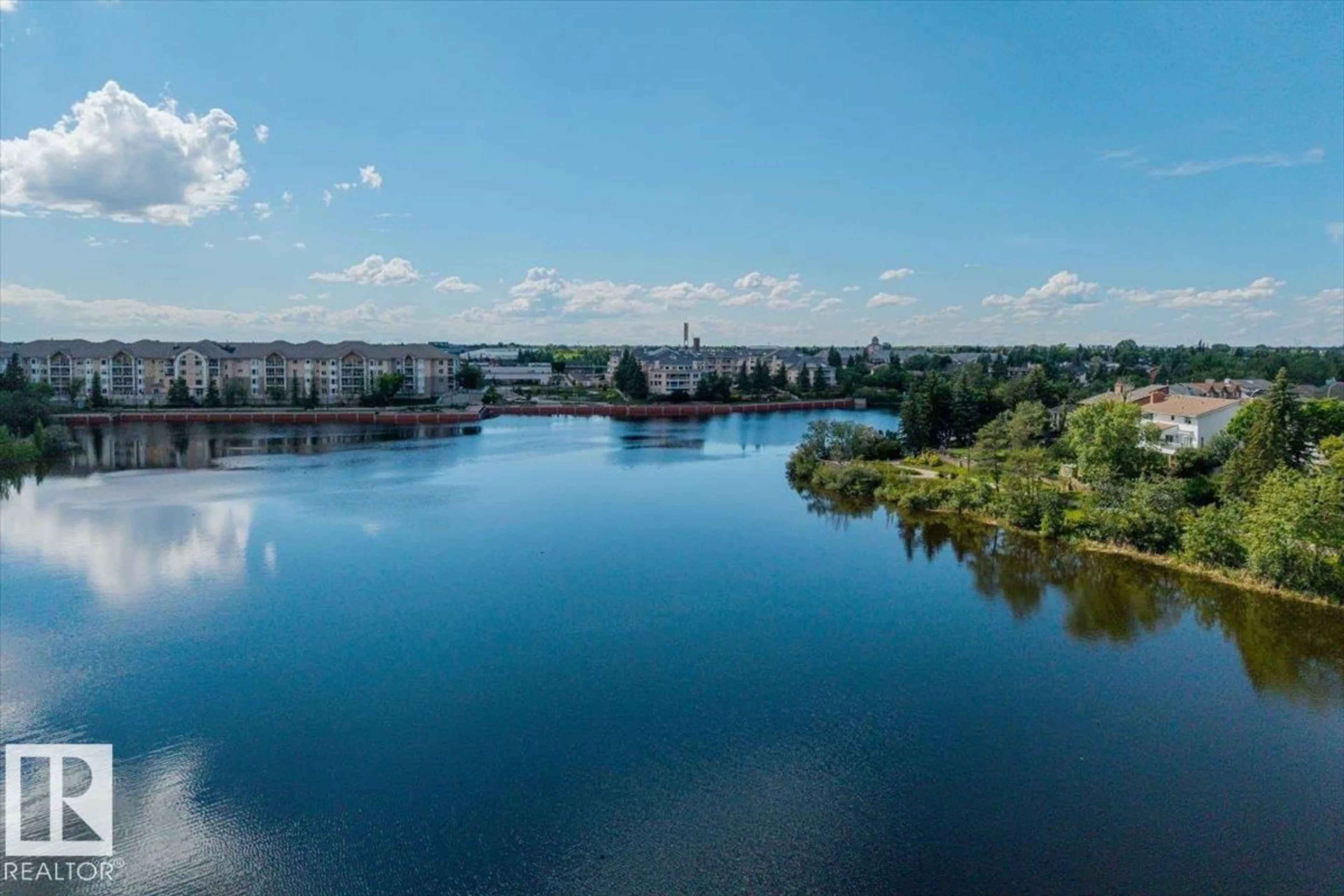 A pic from outside/outdoor area/front of a property/back of a property/a pic from drone, water/lake/river/ocean view for 15499 - 129 CASTLE DOWNS RD, Edmonton Alberta T5X5Y3