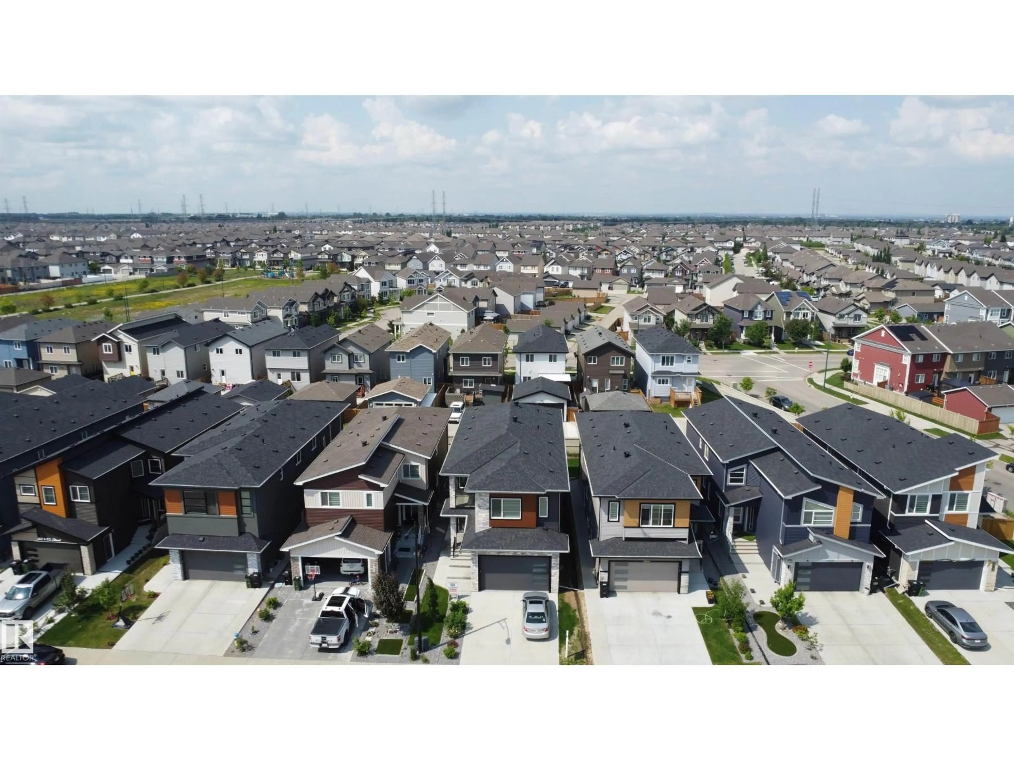 A pic from outside/outdoor area/front of a property/back of a property/a pic from drone, street for 1836 22 ST, Edmonton Alberta T6T2M5