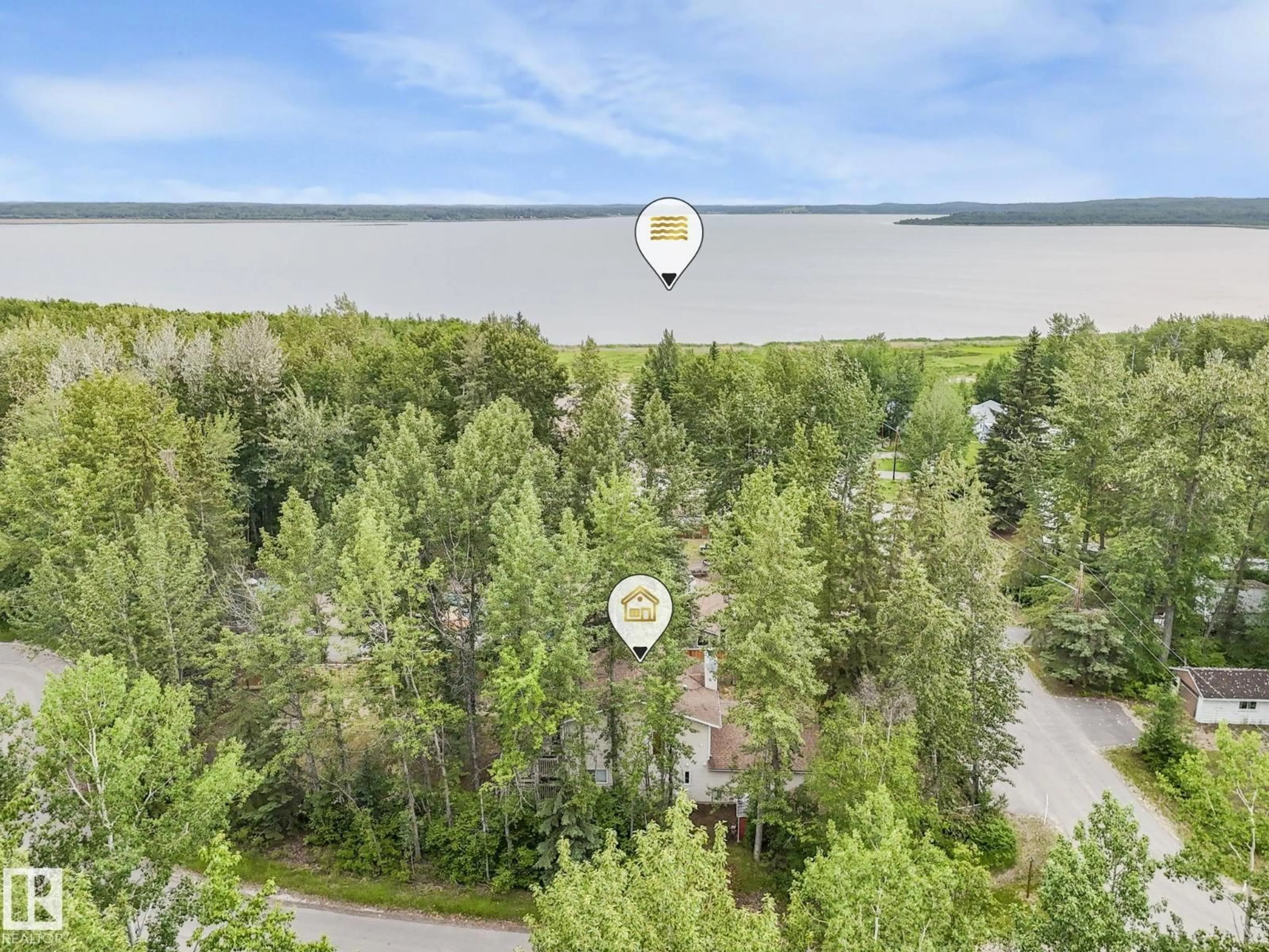 A pic from outside/outdoor area/front of a property/back of a property/a pic from drone, forest/trees view for 615 ASH ST, Rural Sturgeon County Alberta T8R0K4