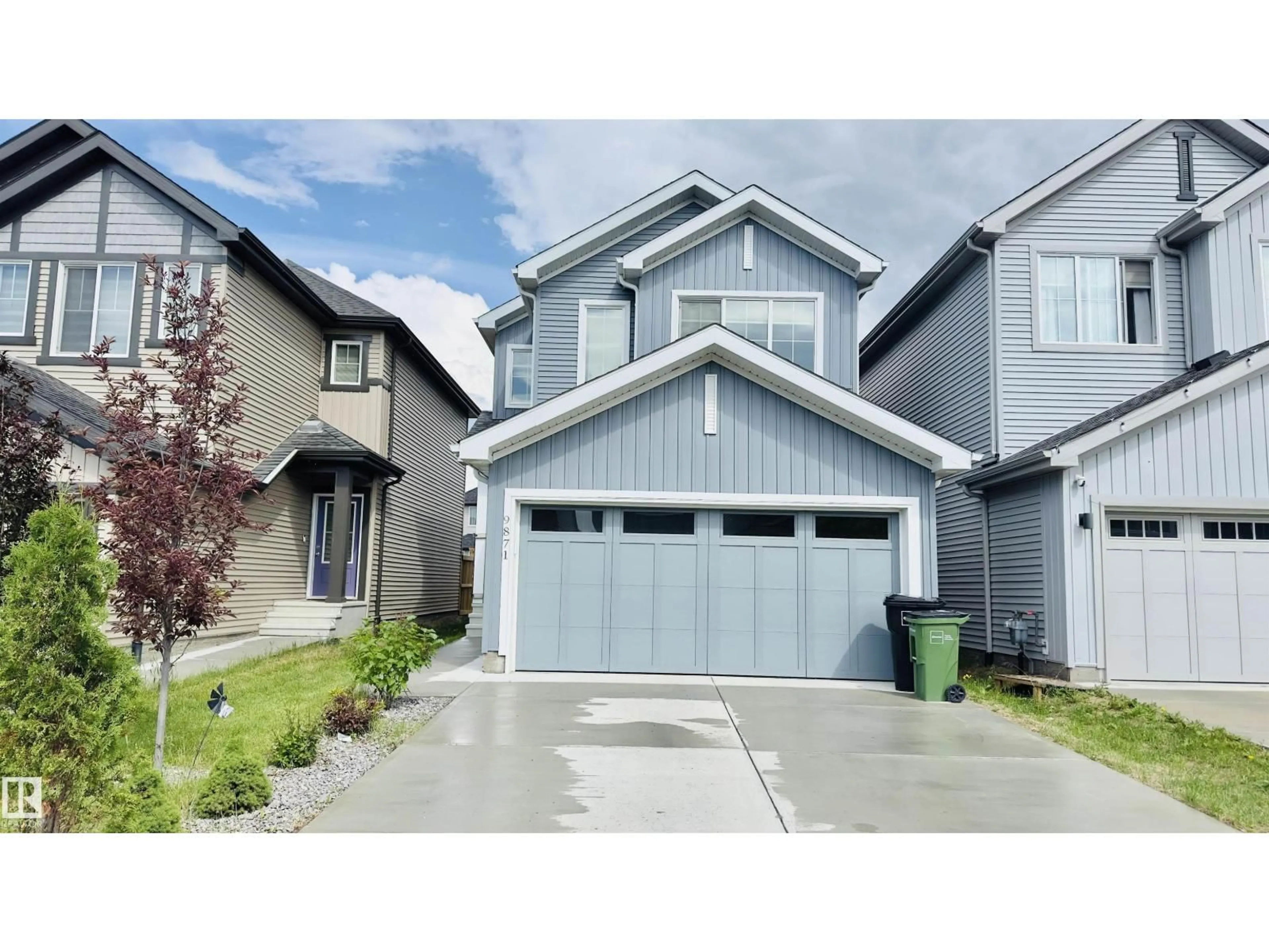 Home with vinyl exterior material, street for 9871 226 ST, Edmonton Alberta T5T7V2