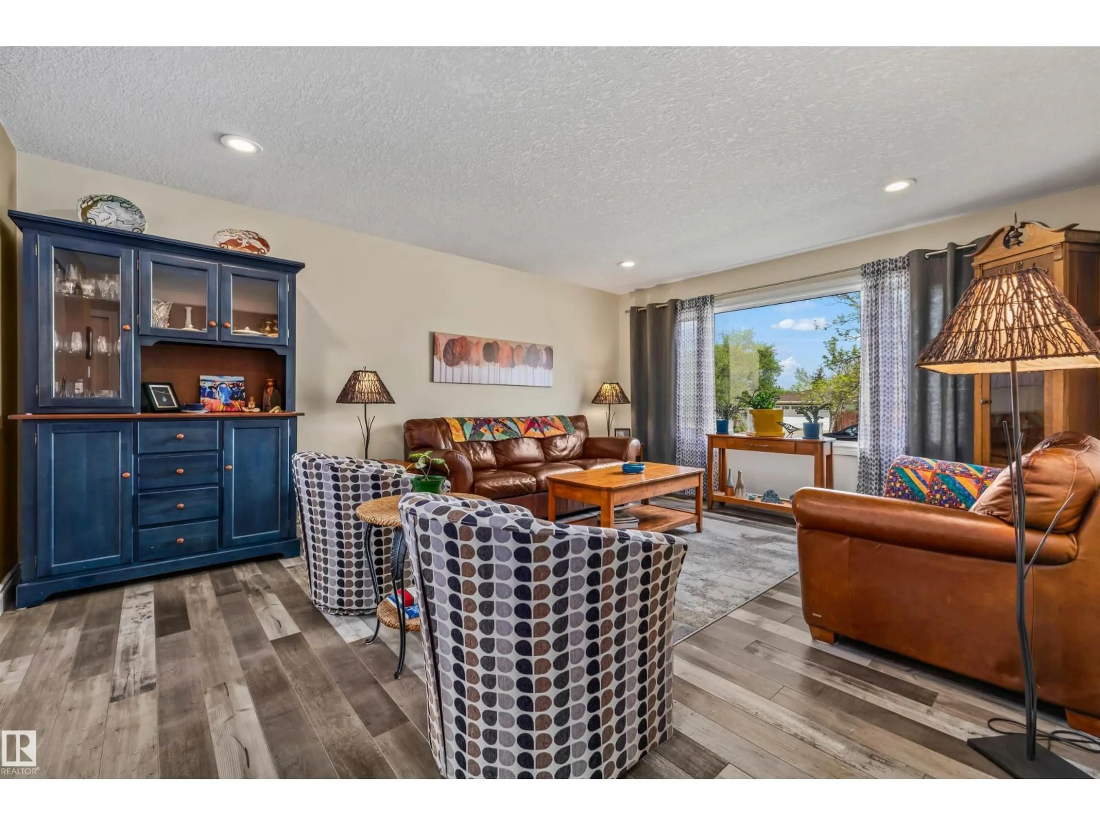 Living room with furniture, unknown for 9438 89 ST, Fort Saskatchewan Alberta T8L1J1
