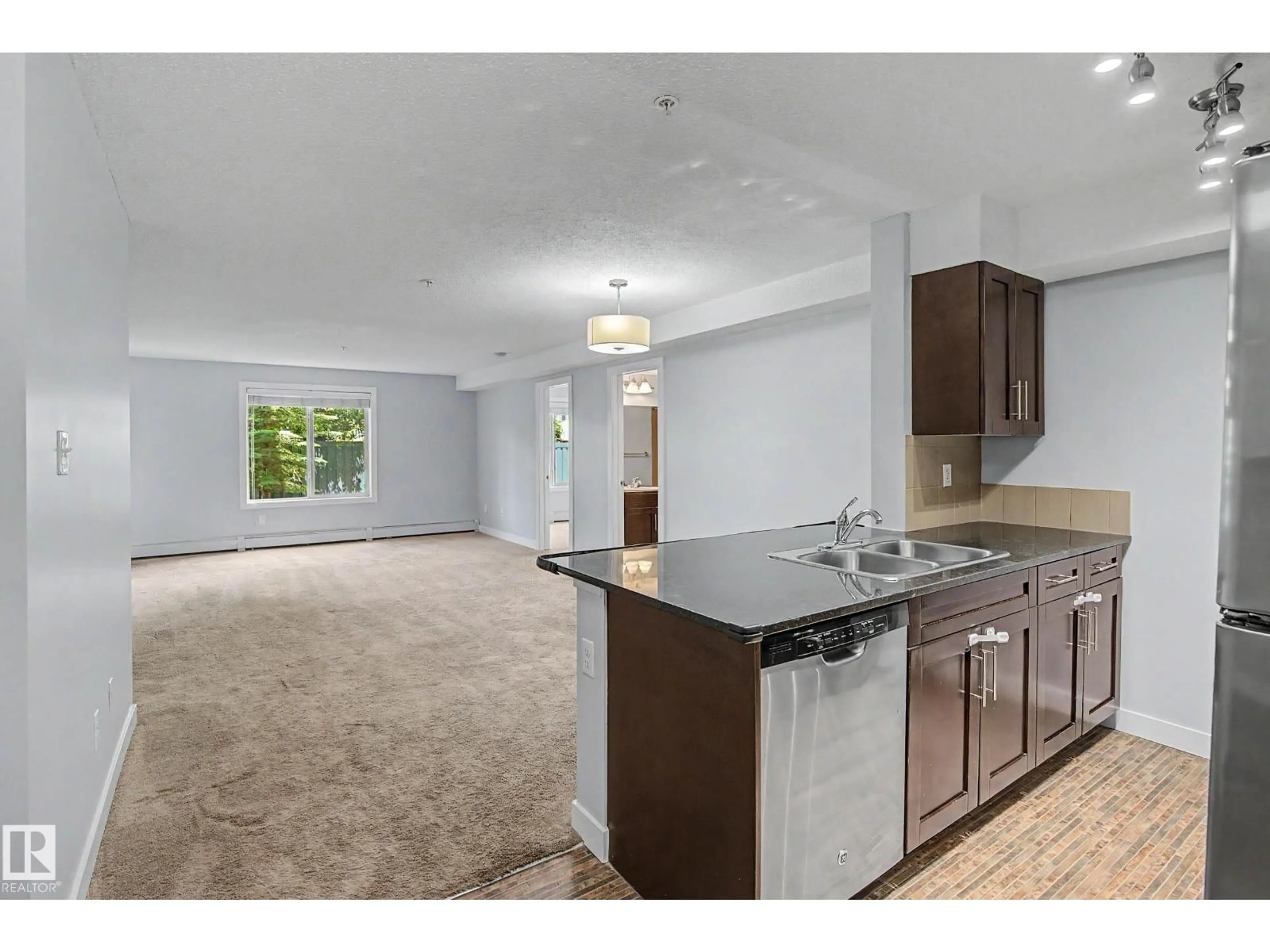 Open concept kitchen, unknown for #108 - 11812 22 AV, Edmonton Alberta T6W2A2