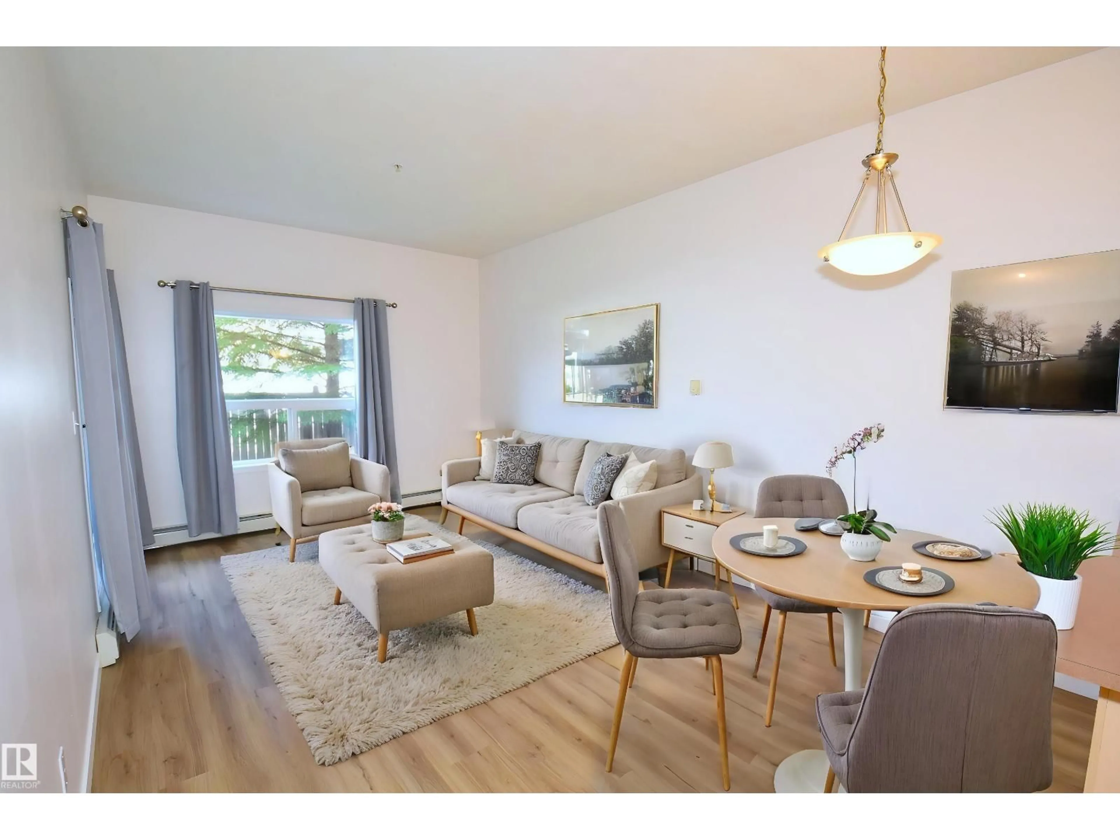 Living room with furniture, wood/laminate floor for #103 - 4310 33 ST, Stony Plain Alberta T7Z0A8