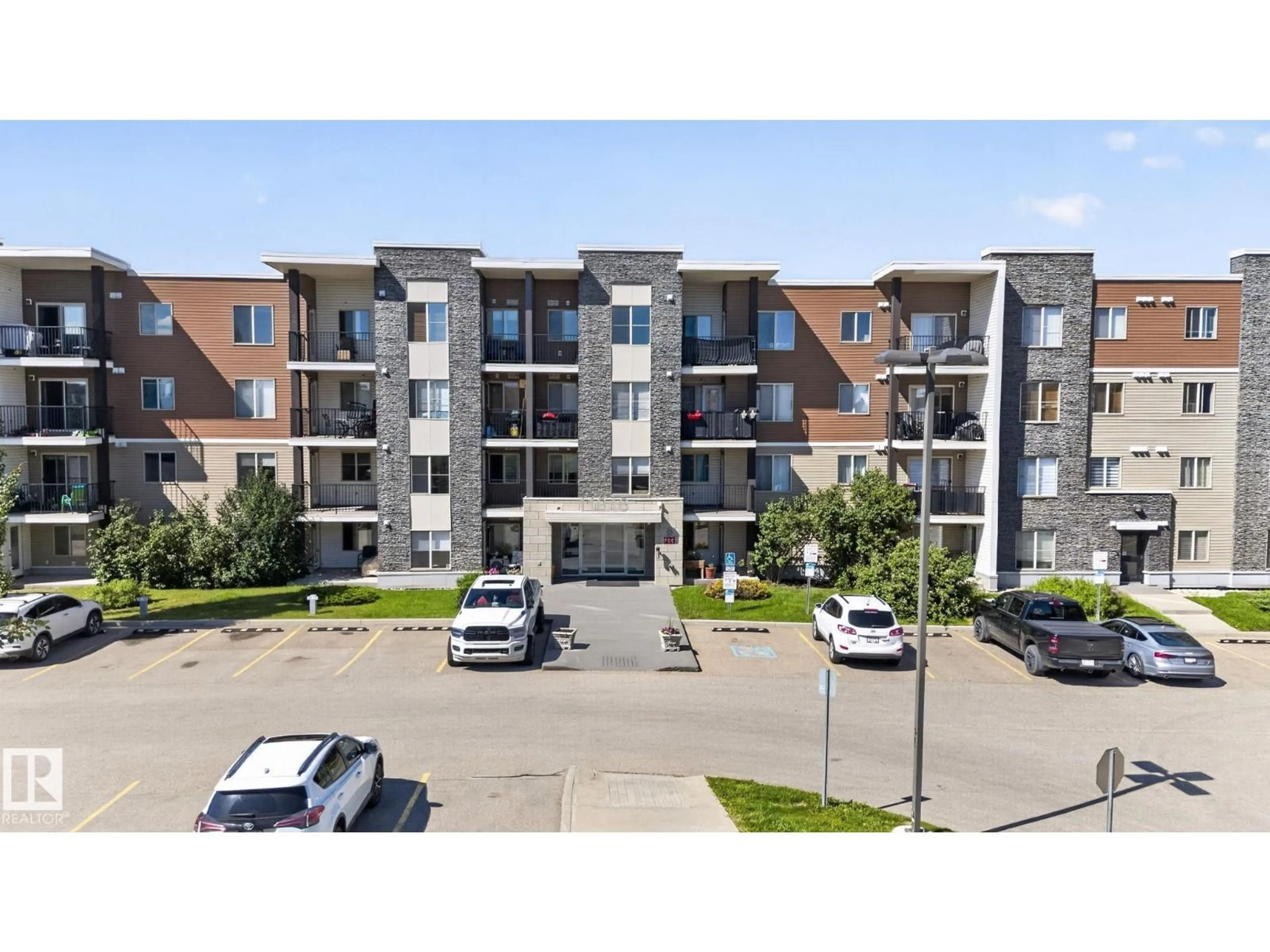 A pic from outside/outdoor area/front of a property/back of a property/a pic from drone, street for 205 - 11816 22 AV, Edmonton Alberta T6W2A2
