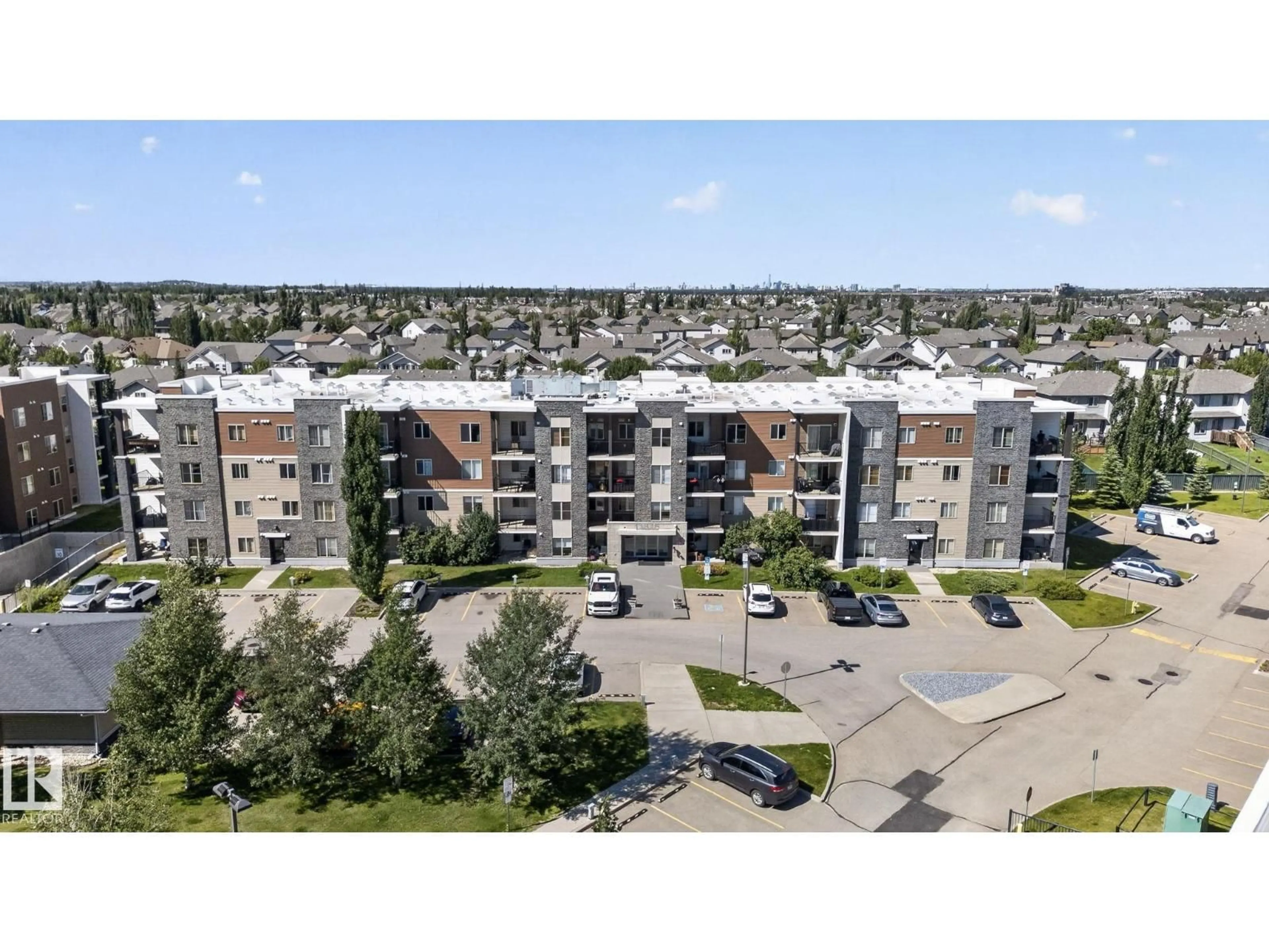 A pic from outside/outdoor area/front of a property/back of a property/a pic from drone, unknown for 205 - 11816 22 AV, Edmonton Alberta T6W2A2