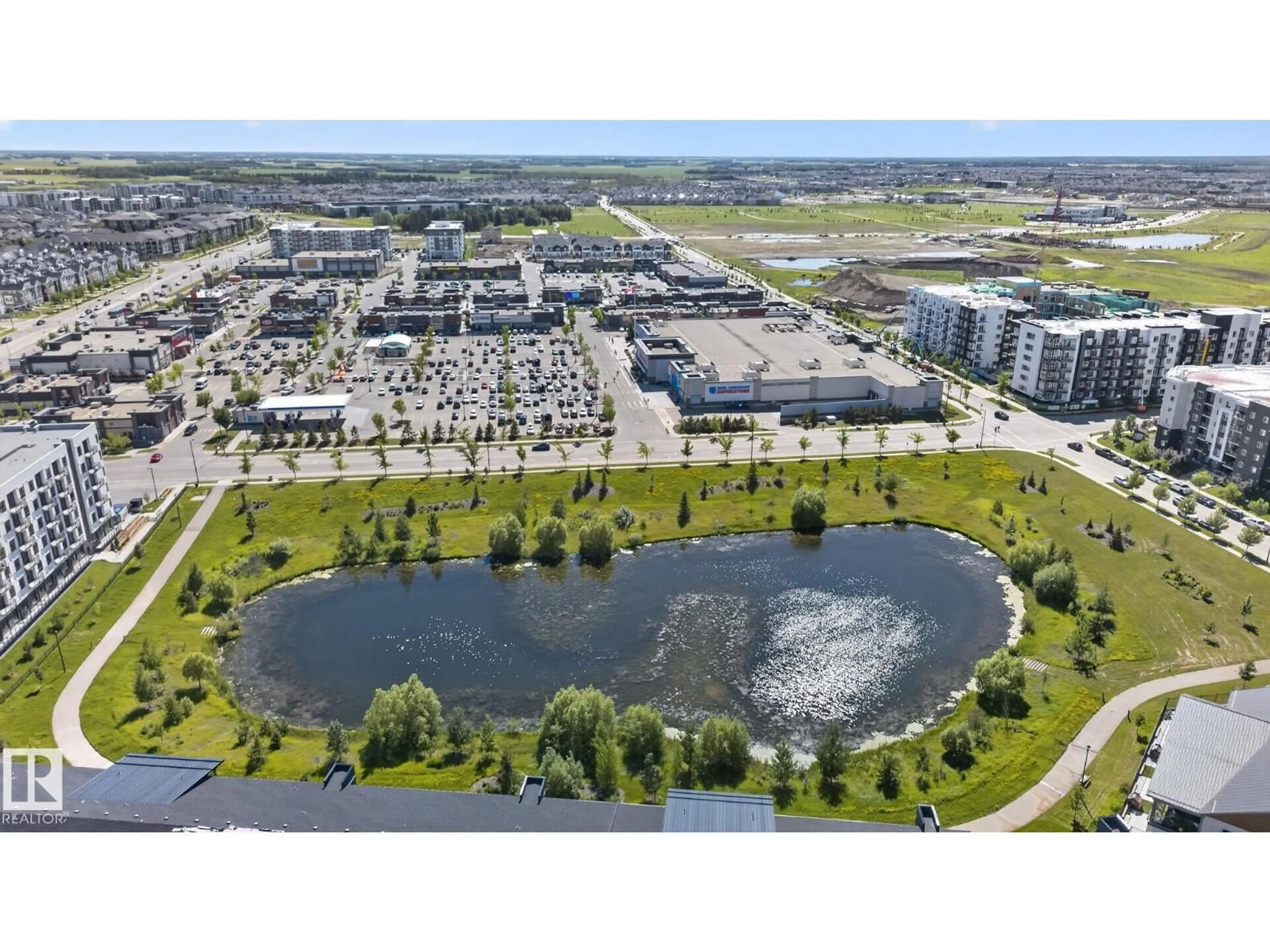 A pic from outside/outdoor area/front of a property/back of a property/a pic from drone, water/lake/river/ocean view for 205 - 11816 22 AV, Edmonton Alberta T6W2A2