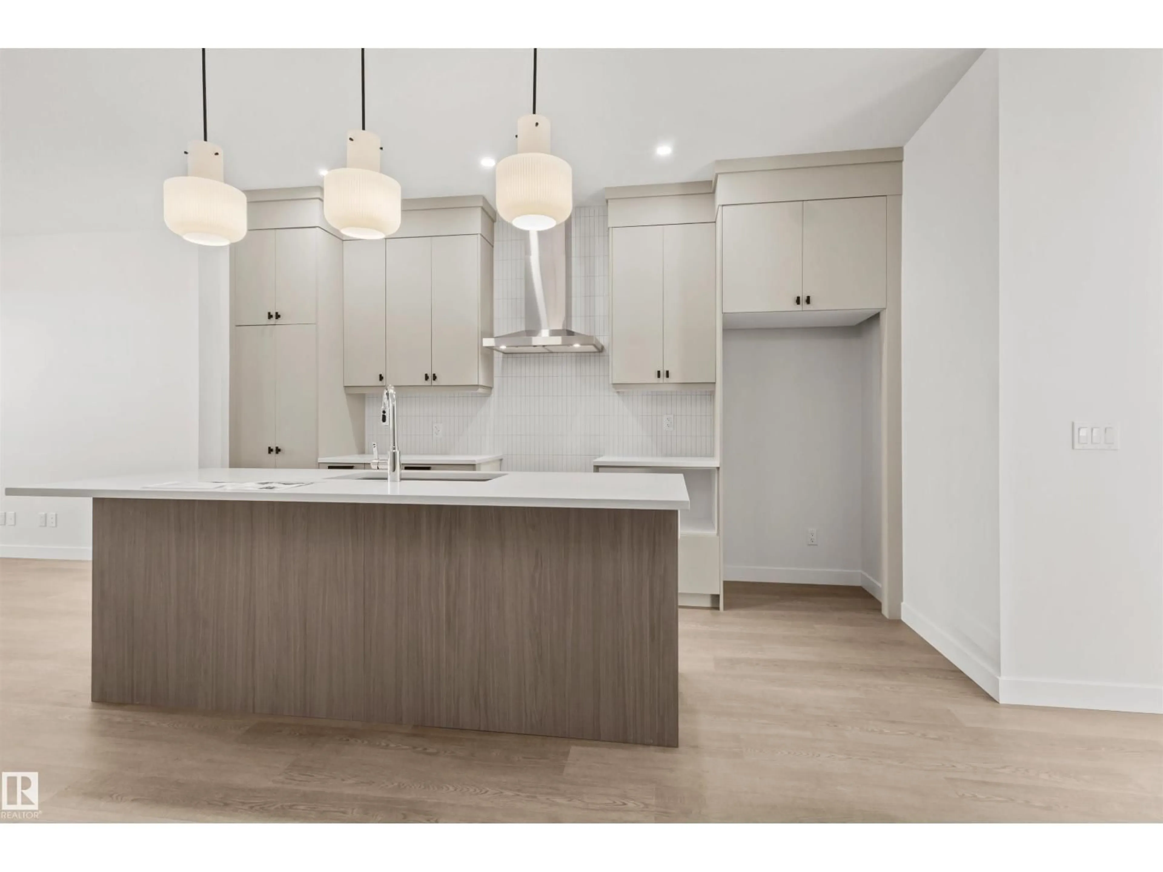 Open concept kitchen, wood/laminate floor for SW - 284 PATERSON LI, Edmonton Alberta T6W5V2